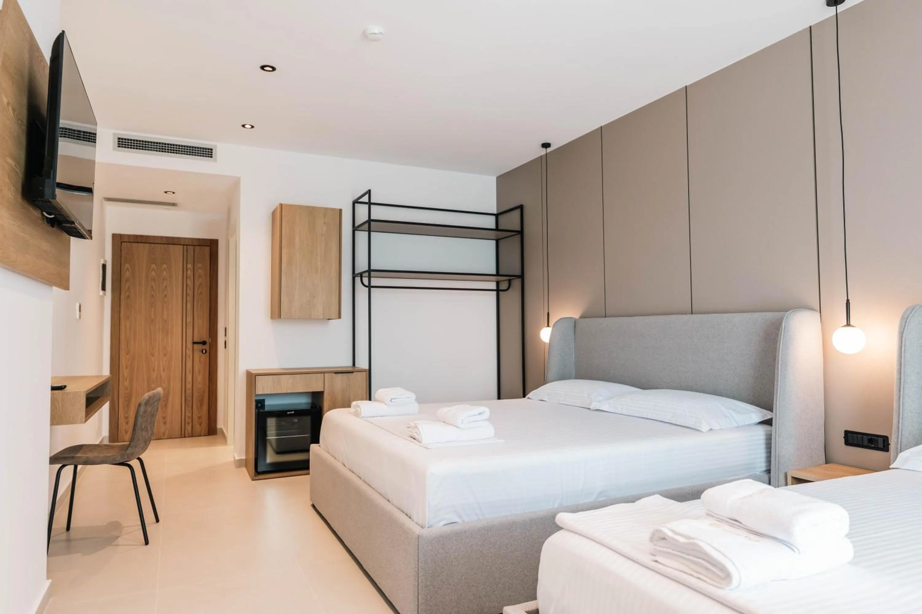 Communal lounge/ TV room, Bed in Central Park Premium Hotel