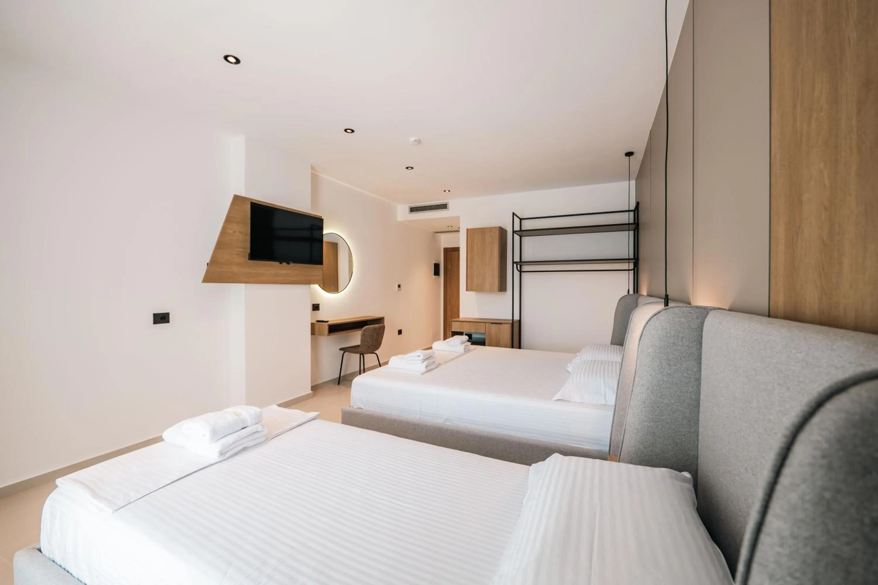 Communal lounge/ TV room, Bed in Central Park Premium Hotel