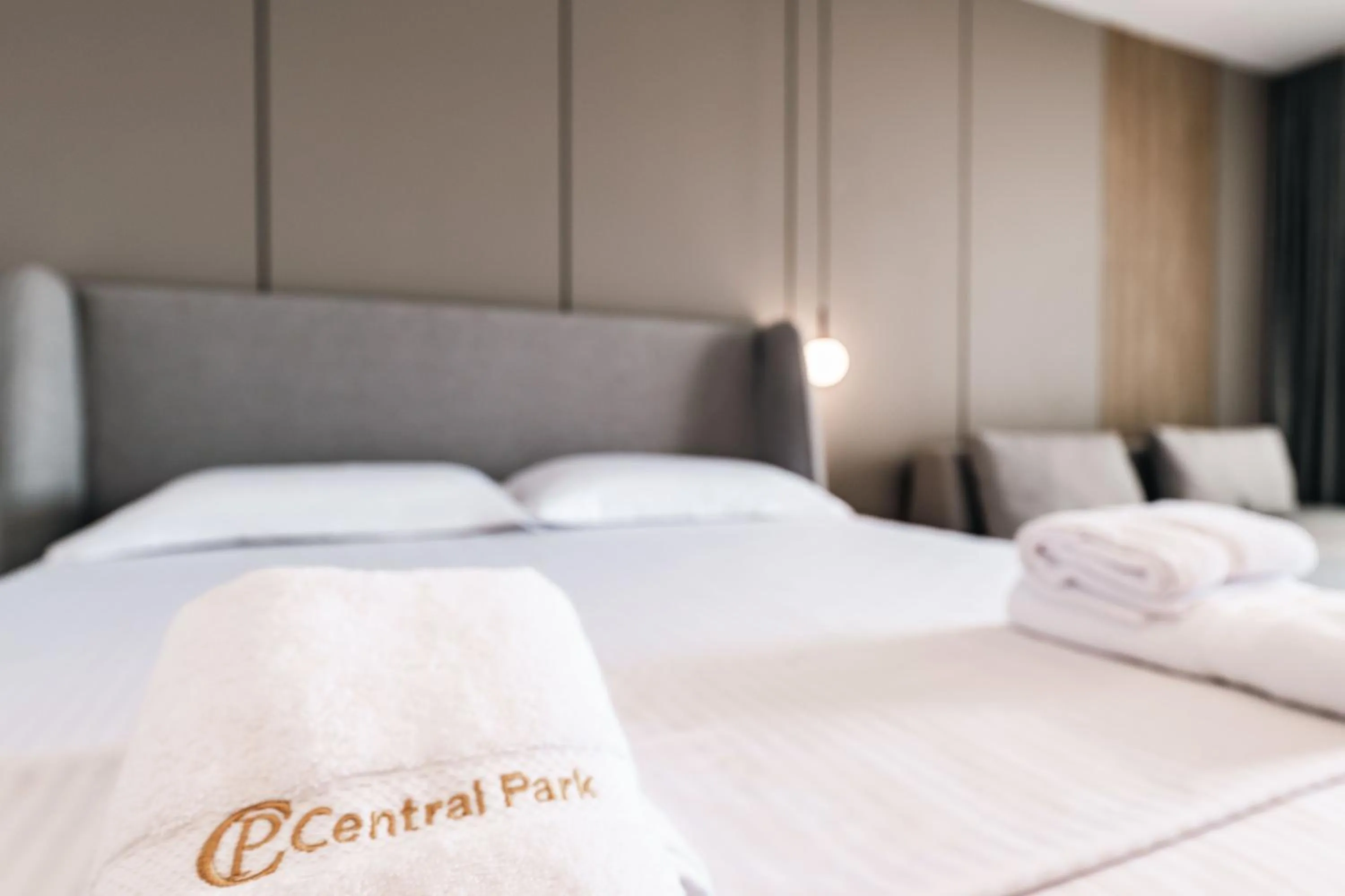 Bed in Central Park Premium Hotel