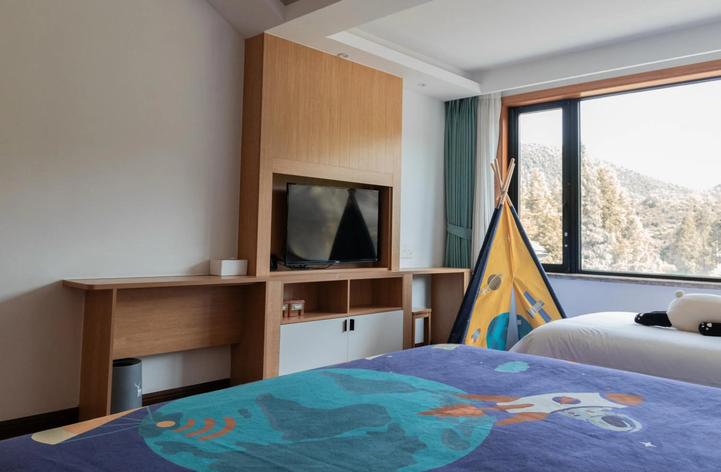 Bed in Nian hotel & resorts