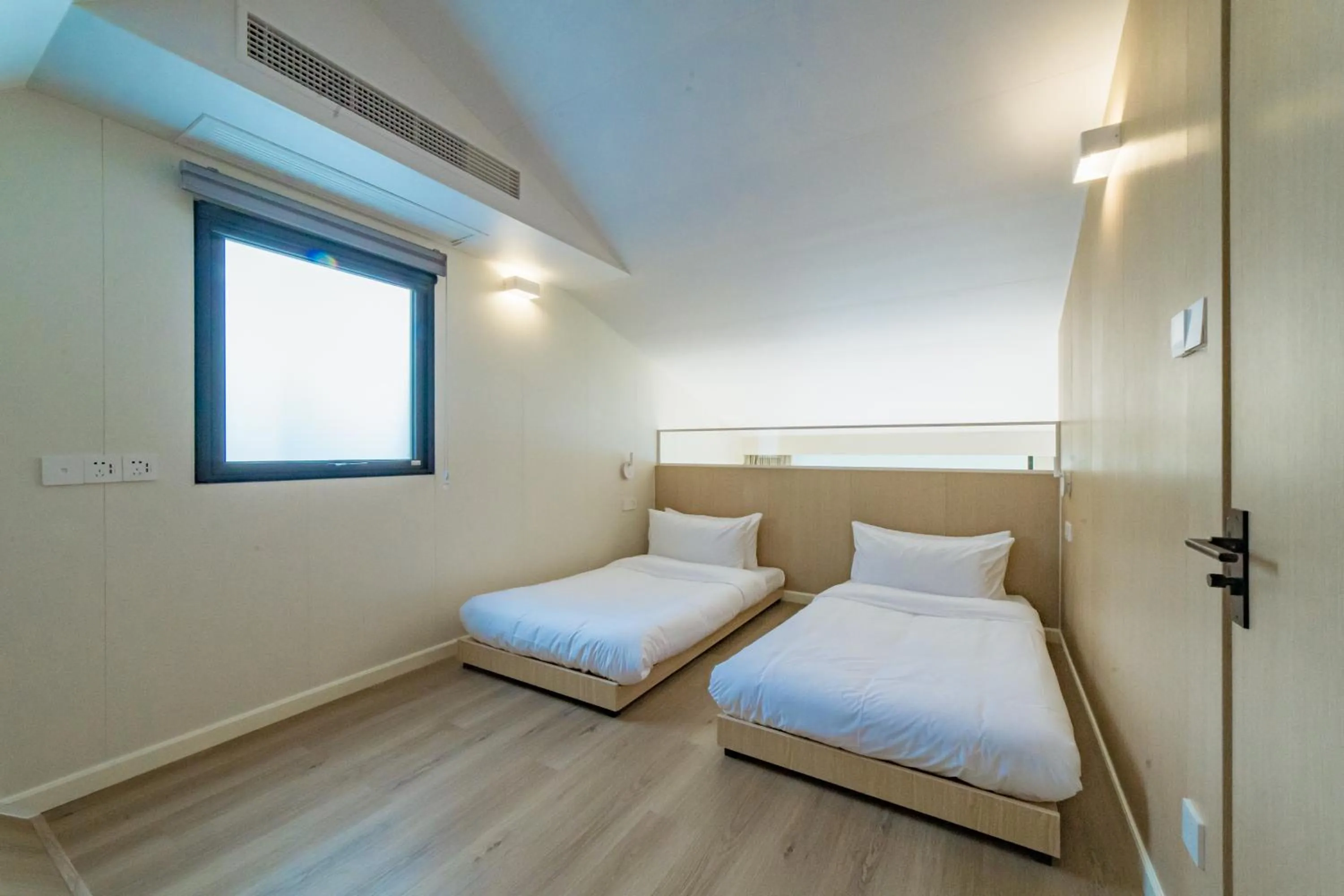 Bed in Nian hotel & resorts