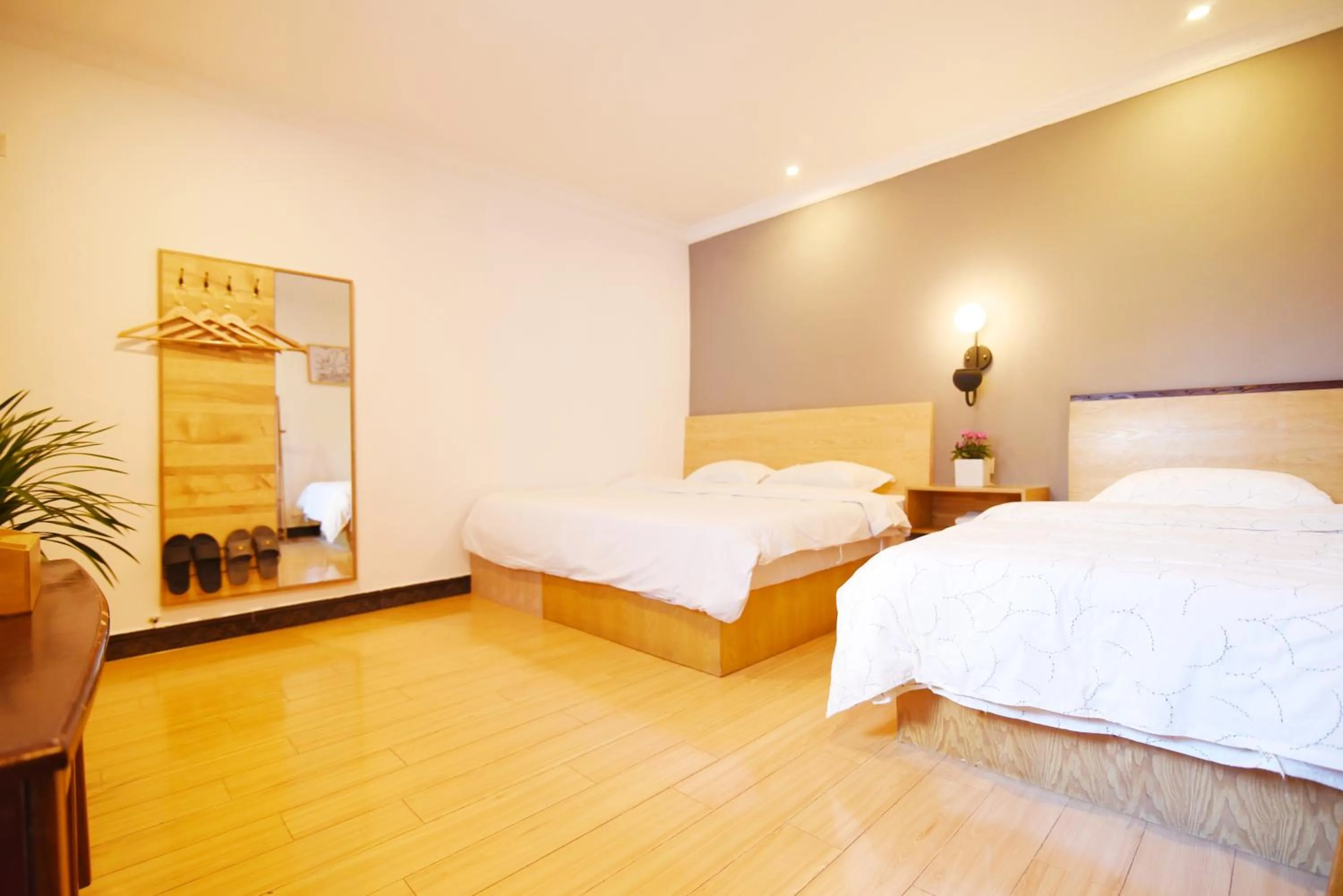 Decorative detail, Bed in Guilin Cyan Box Guest House