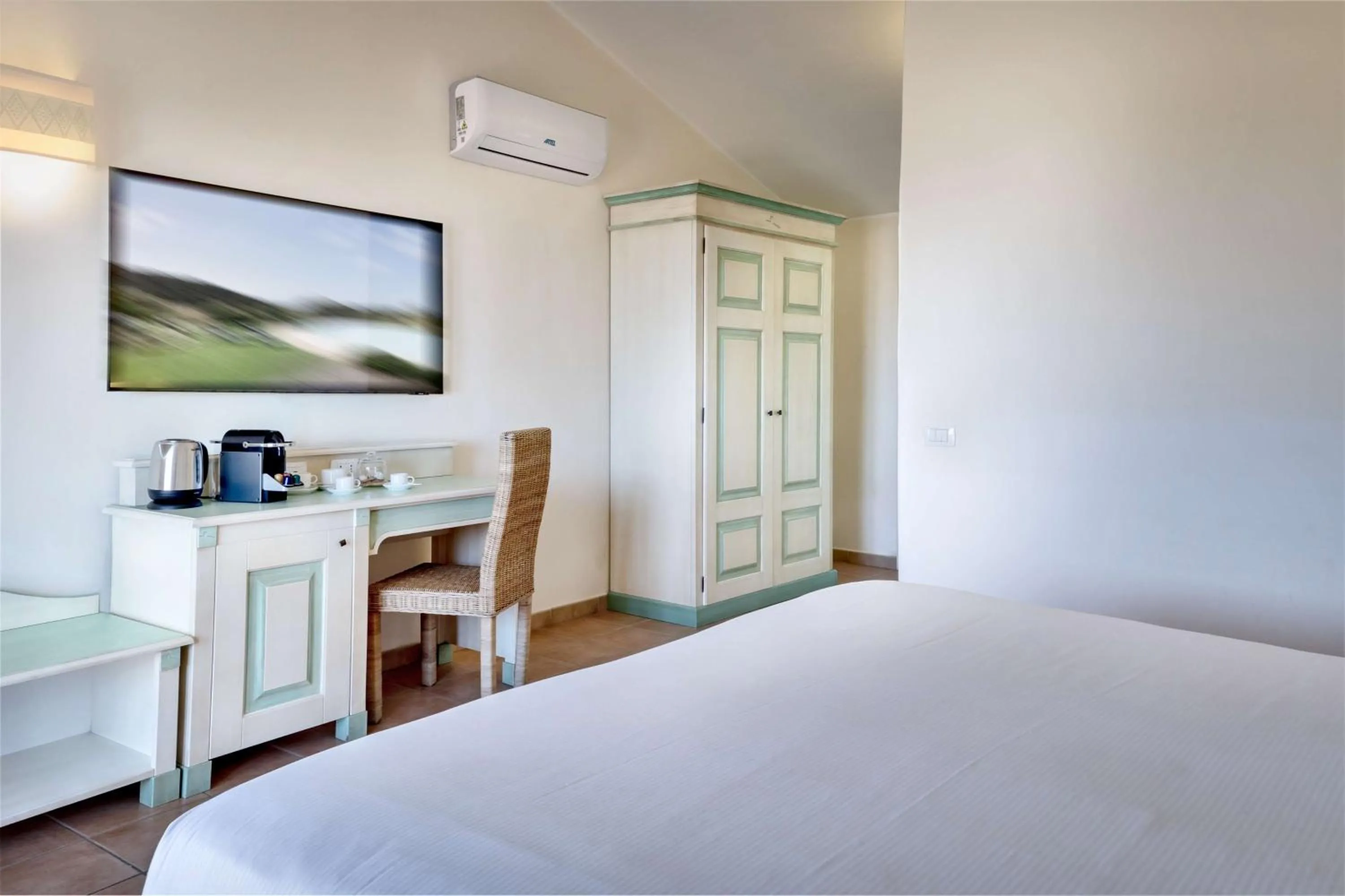 Bedroom, Bed in Veridia Resort Sardinia, a member of Radisson Individuals