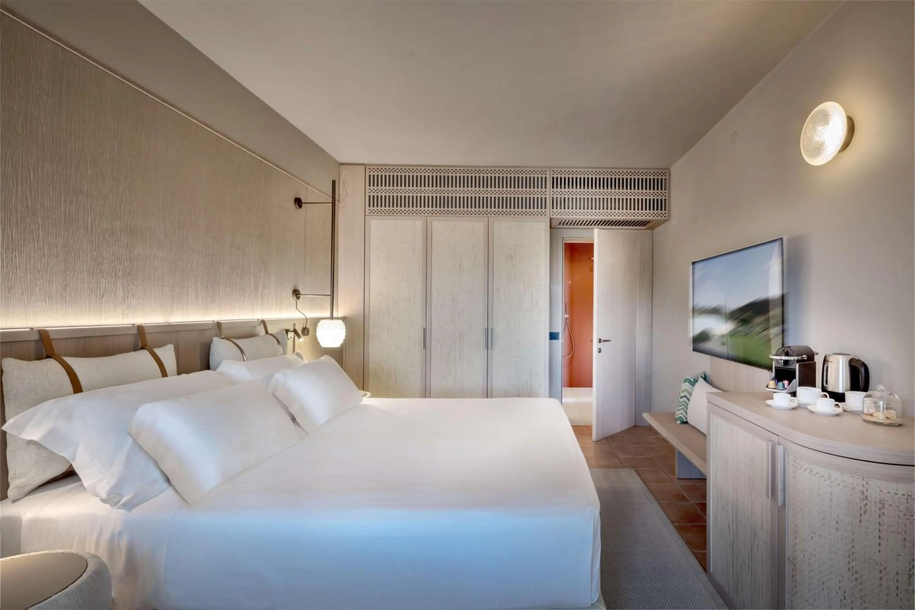 Bedroom, Bed in Veridia Resort Sardinia, a member of Radisson Individuals