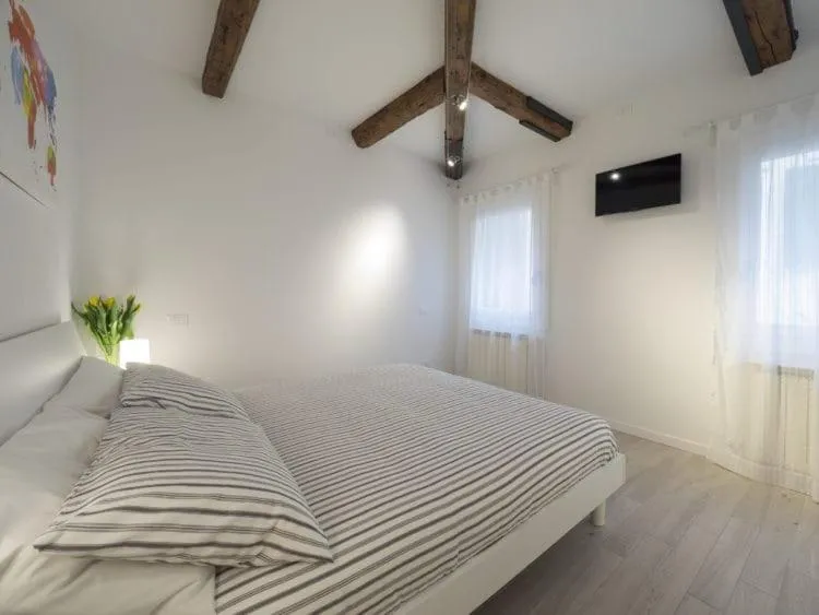 Bed in Ca' dei Scorsoni Apartments