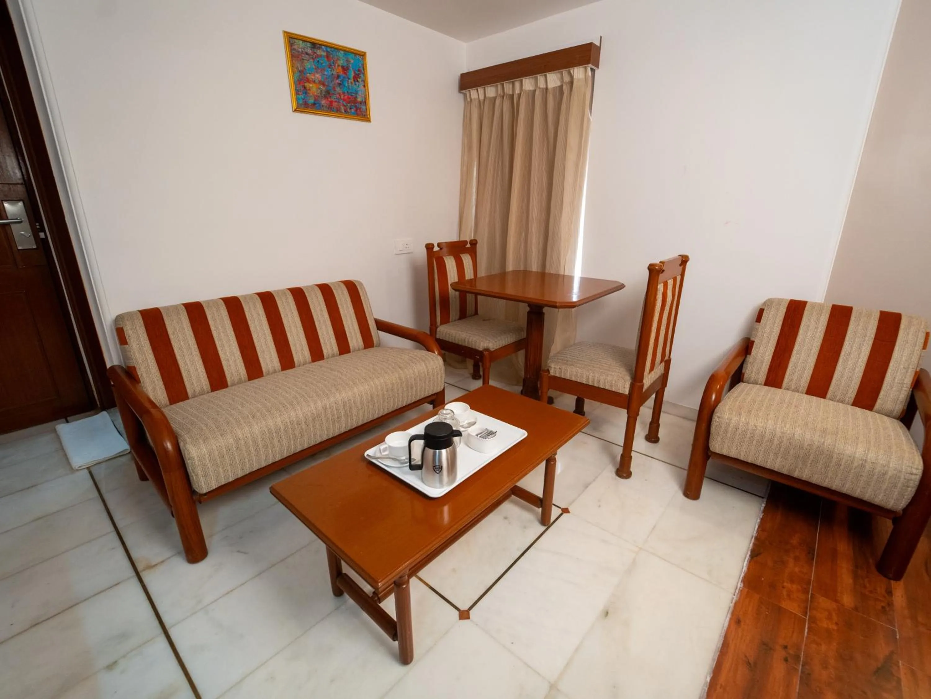 Seating area in Hotel Pravasa Stay