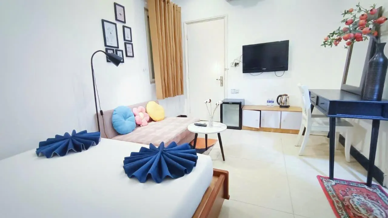 Bed in Queen Central Apartment Hotel