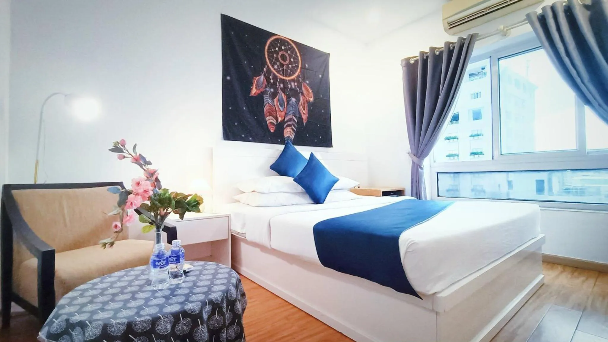 Bed in Queen Central Apartment Hotel