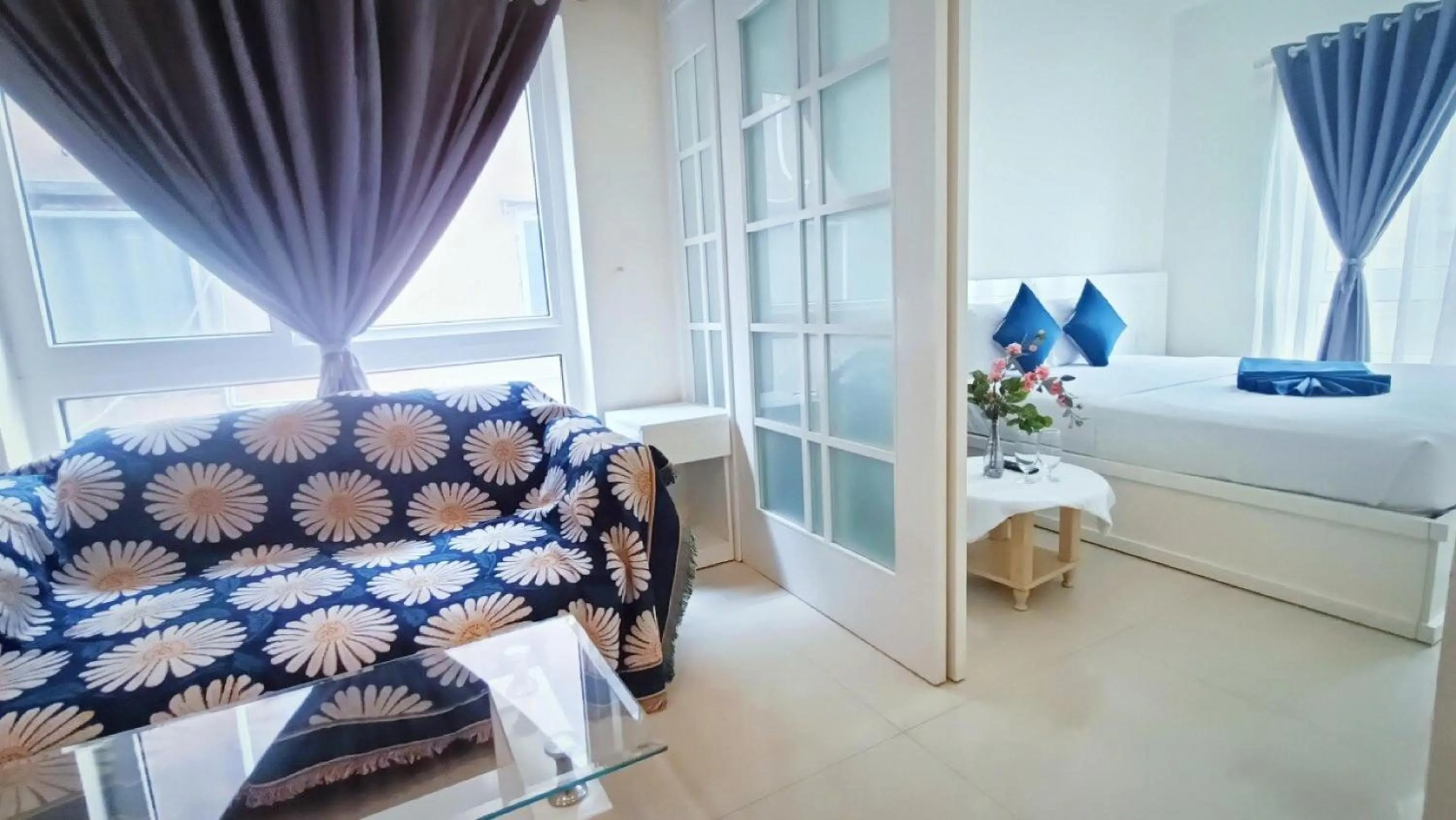 Bed in Queen Central Apartment Hotel