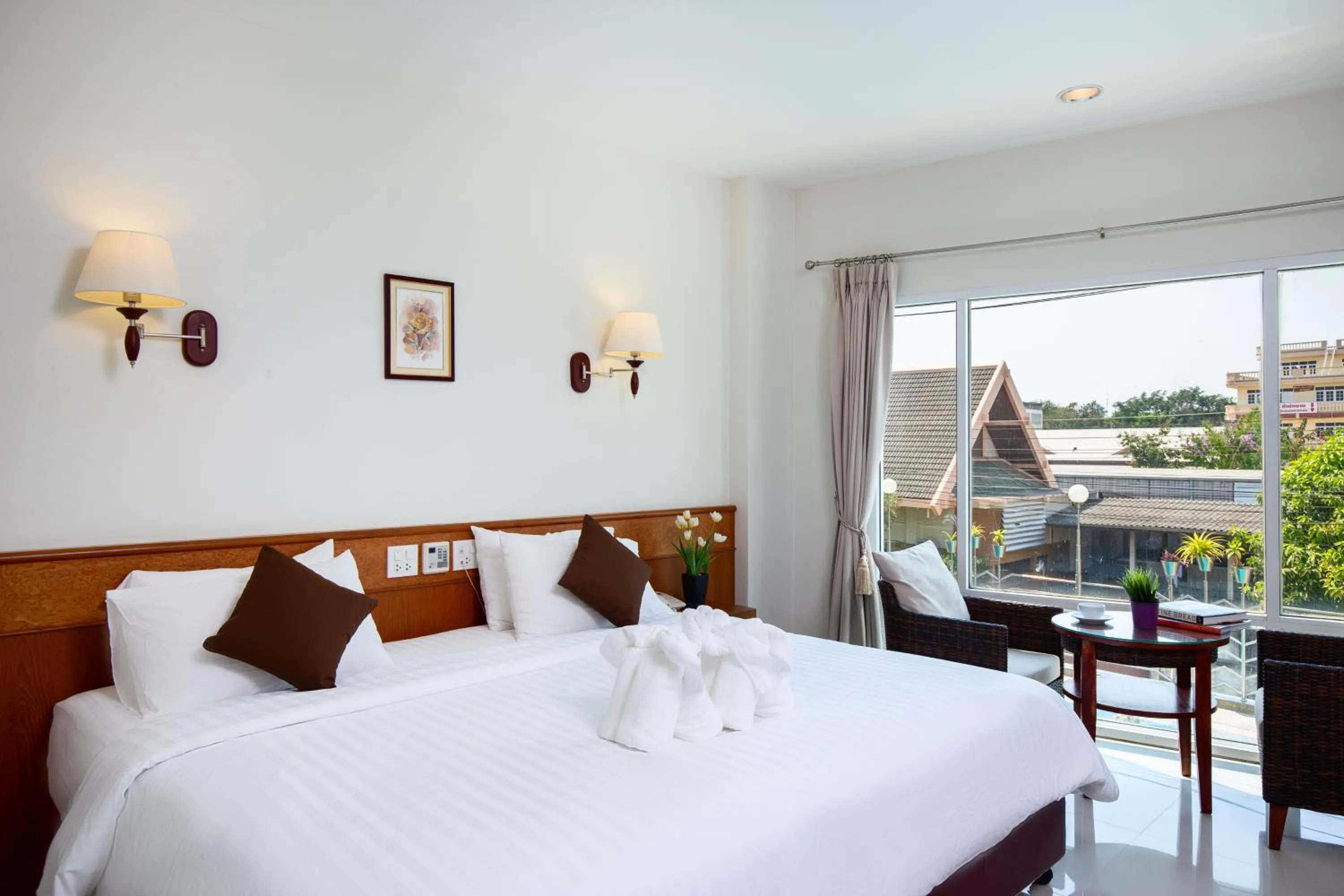 Bed in Kanchanaburi City Hotel