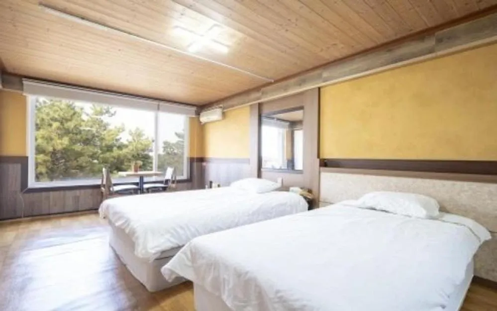 Bed in Jeju Joy Hill Pension