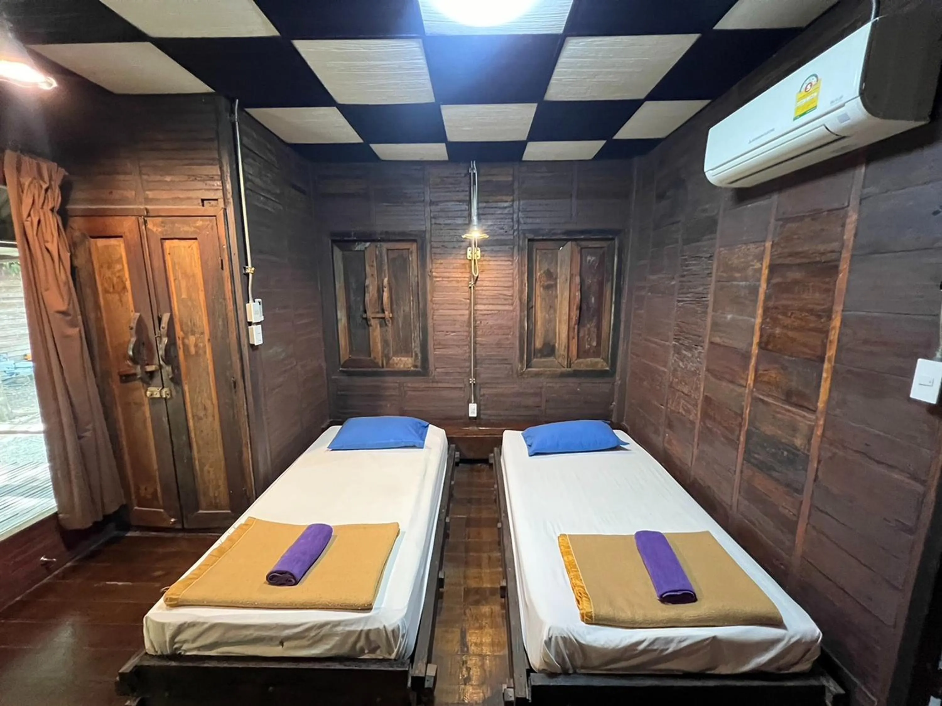 Bed in Pang Mai Resort