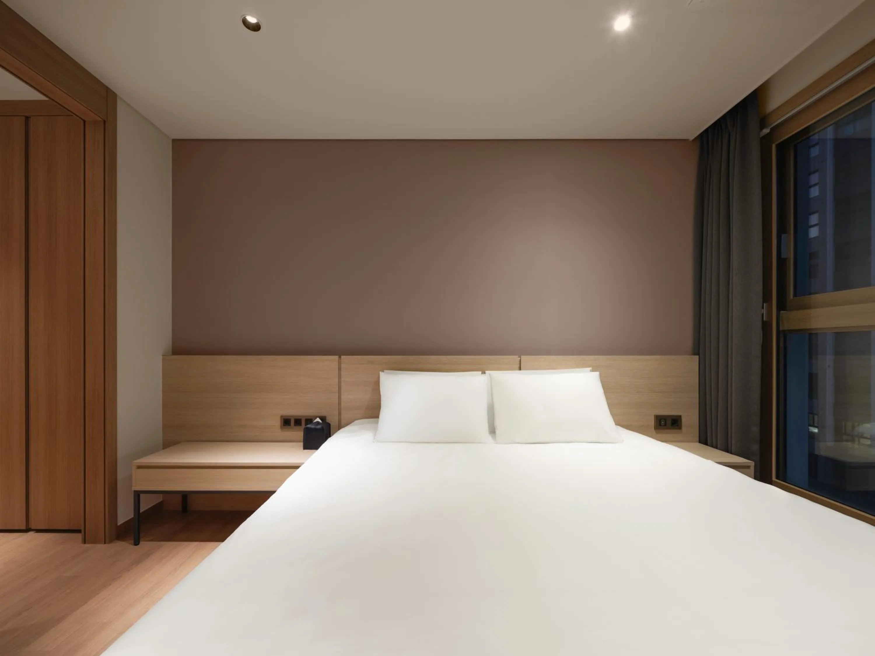 Bed in Le Collective Sokcho Central