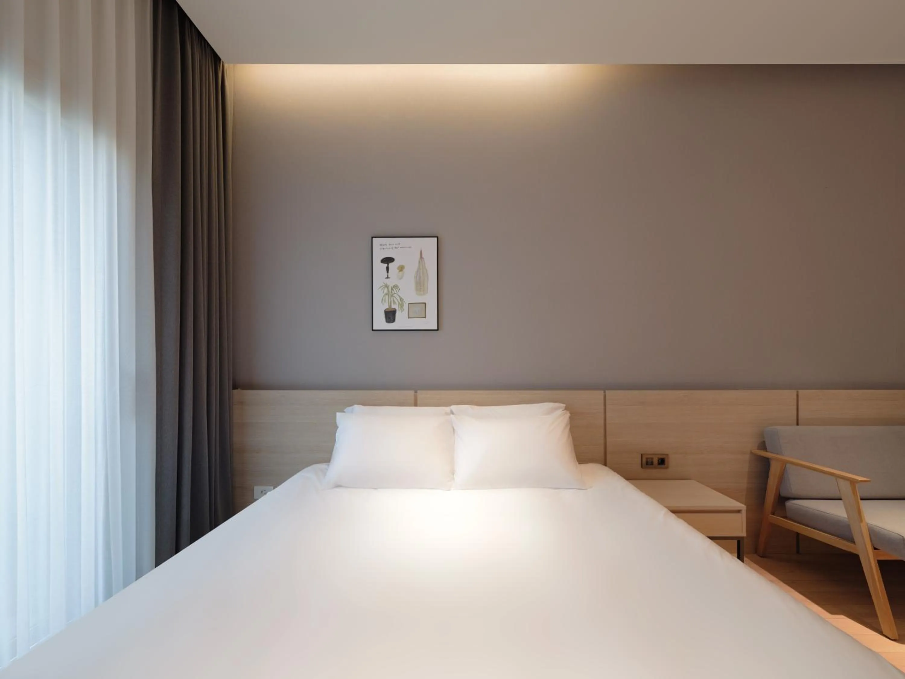 Bed in Le Collective Sokcho Central