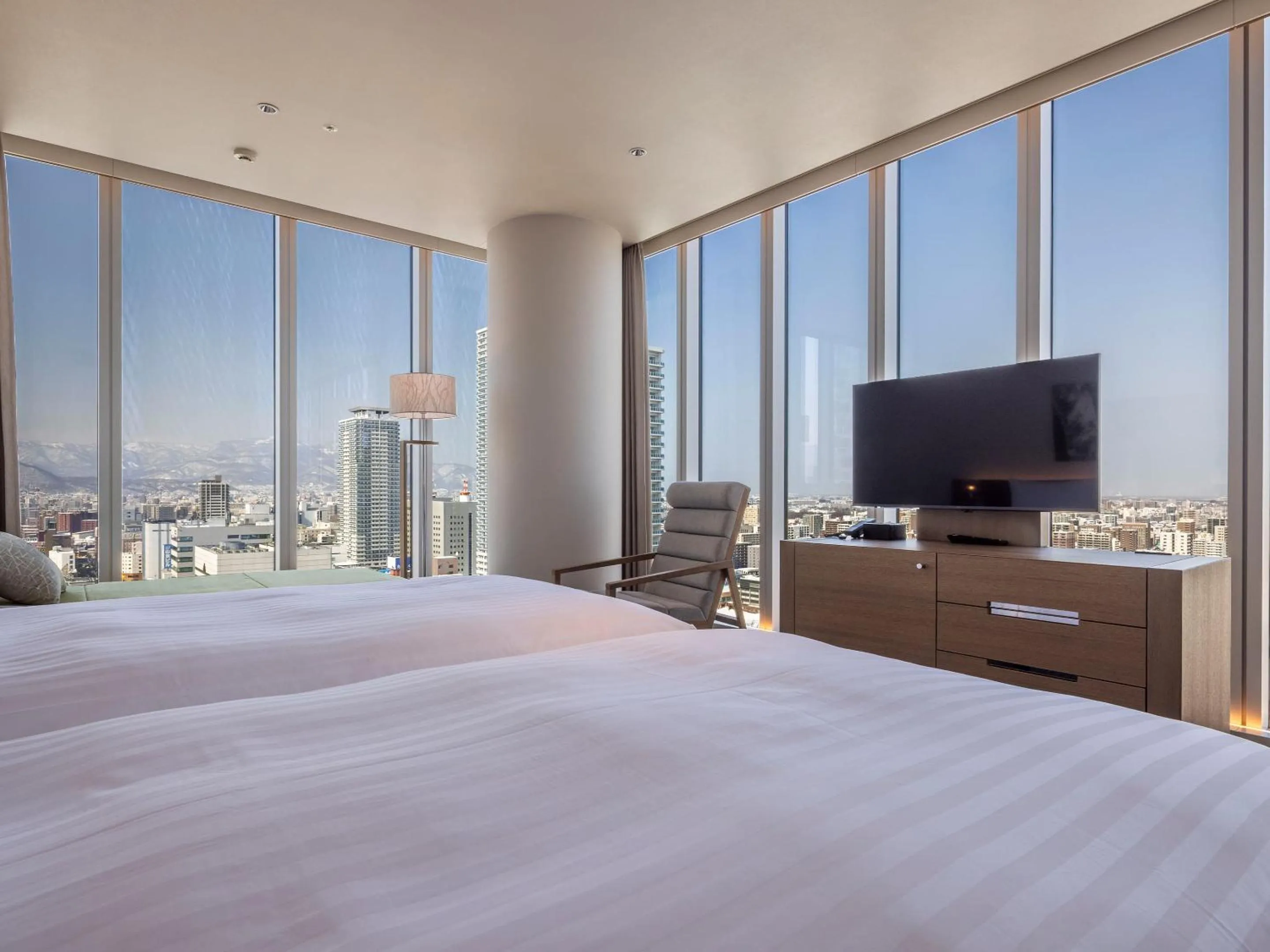 Photo of the whole room, Bed in SAPPORO HOTEL by GRANBELL