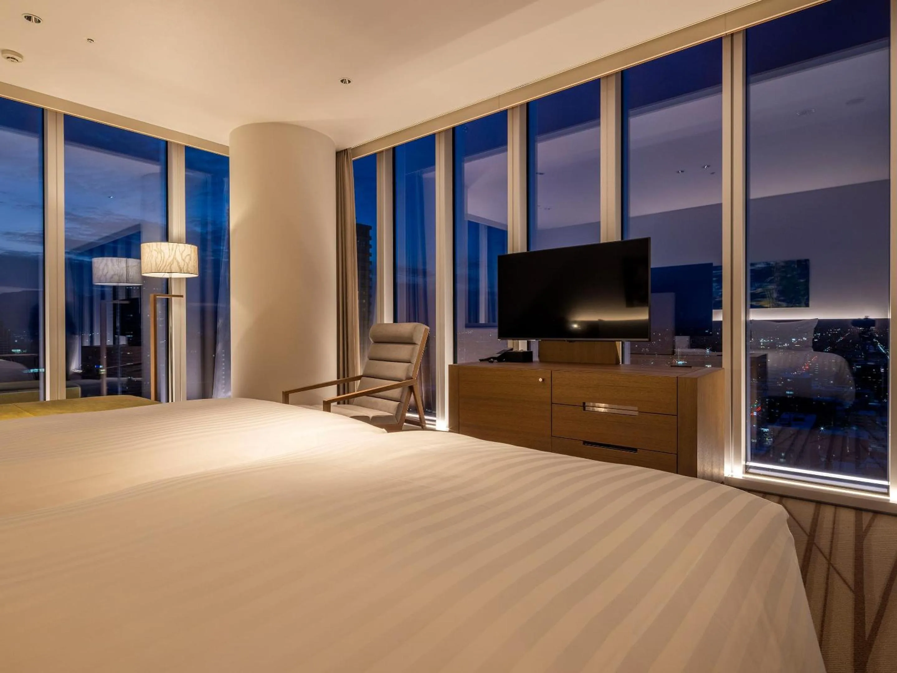 Photo of the whole room, Bed in SAPPORO HOTEL by GRANBELL