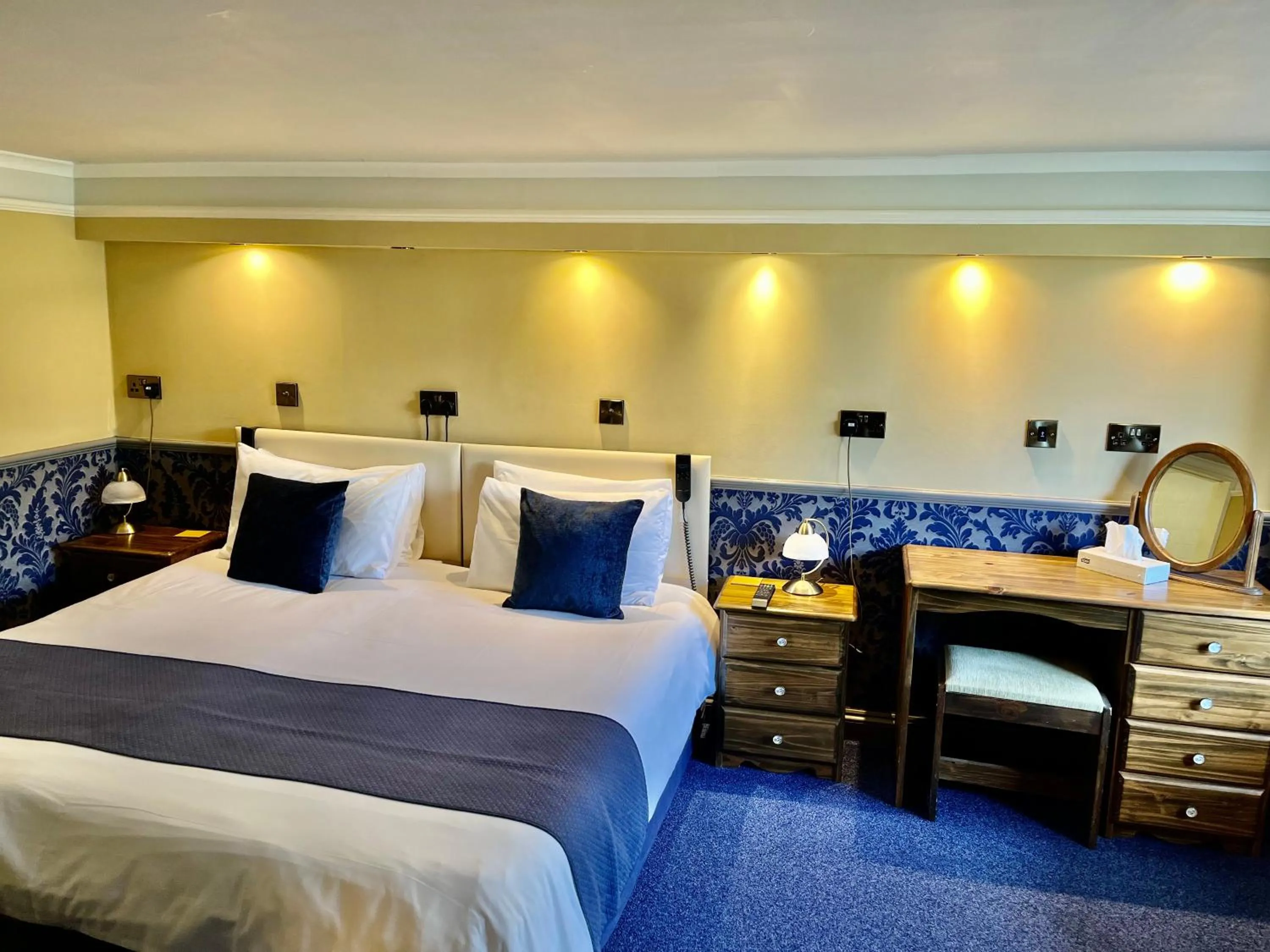 Bed in Atlantis Holiday Apartments