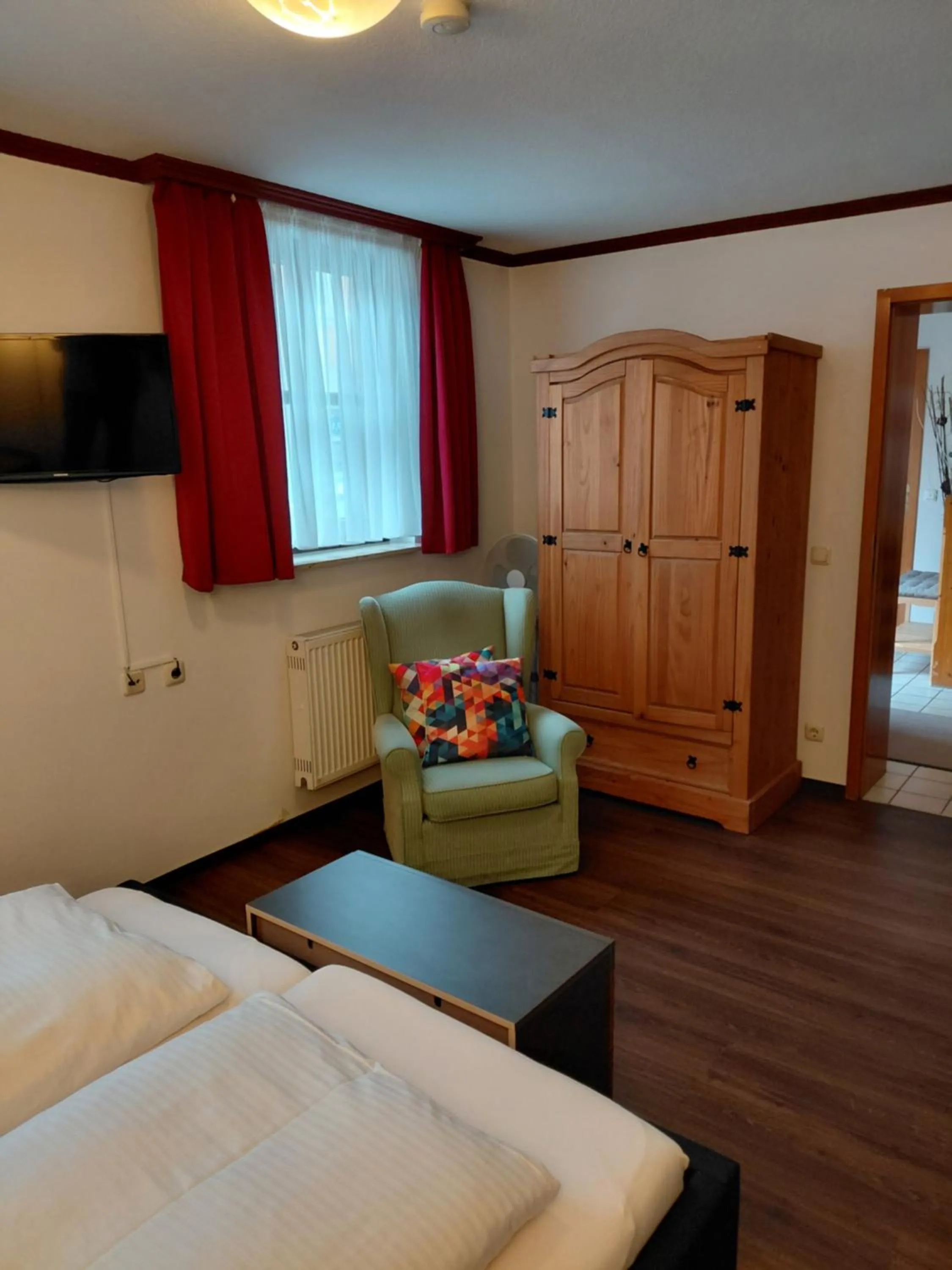 Seating area, Bed in Gästehaus Engelgasse Herzogenaurach