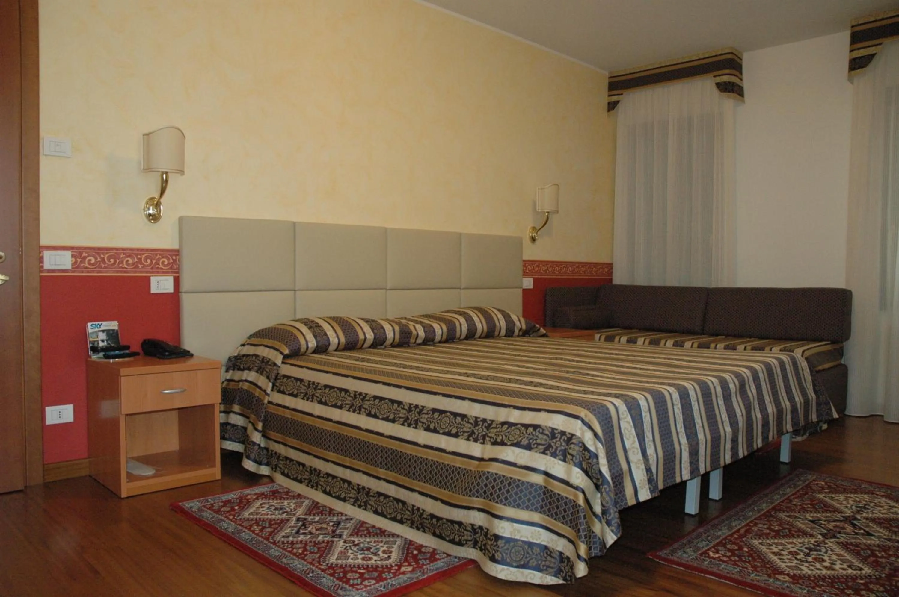 Photo of the whole room, Bed in Hotel Ristorante Dotto