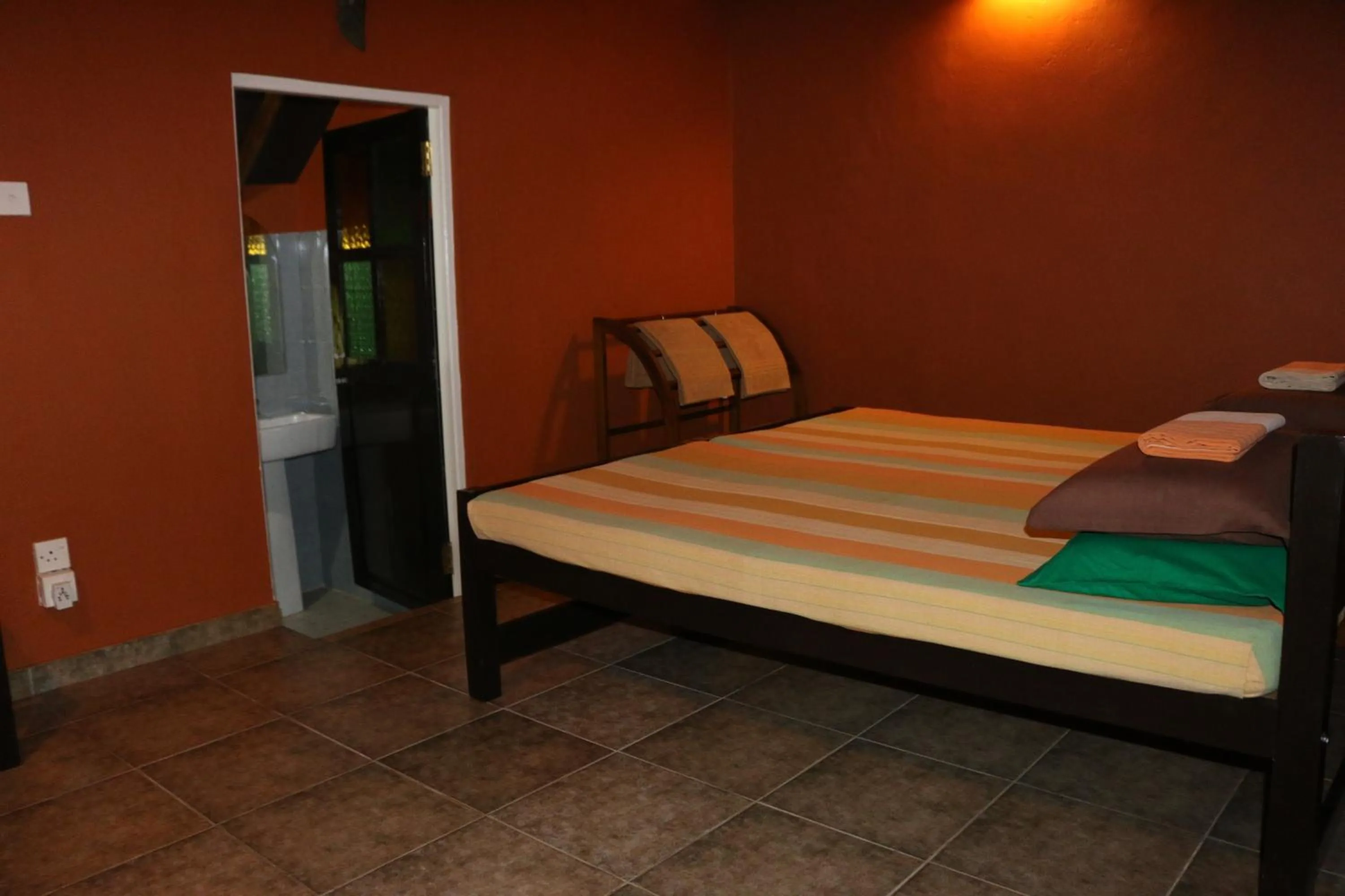 Photo of the whole room, Bed in My Village