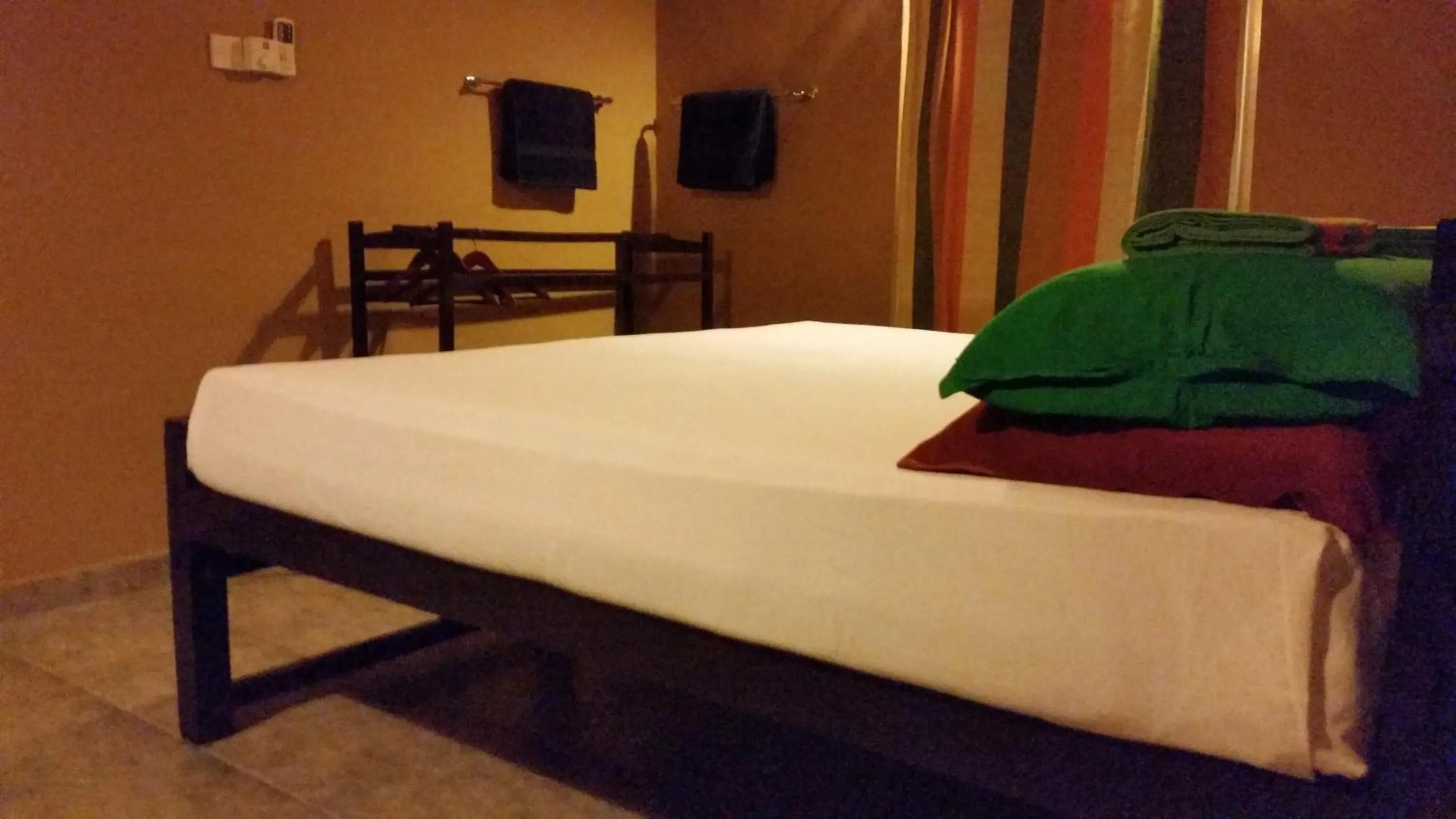 Photo of the whole room, Bed in My Village