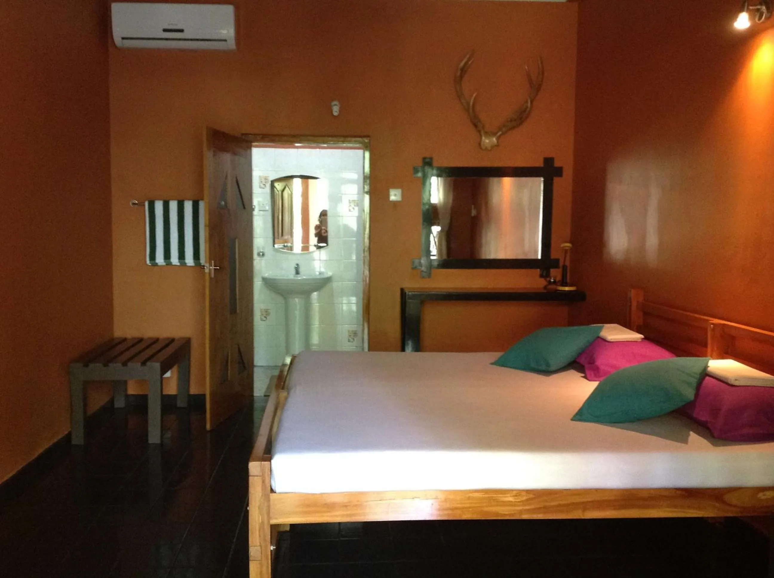 Photo of the whole room, Bed in My Village