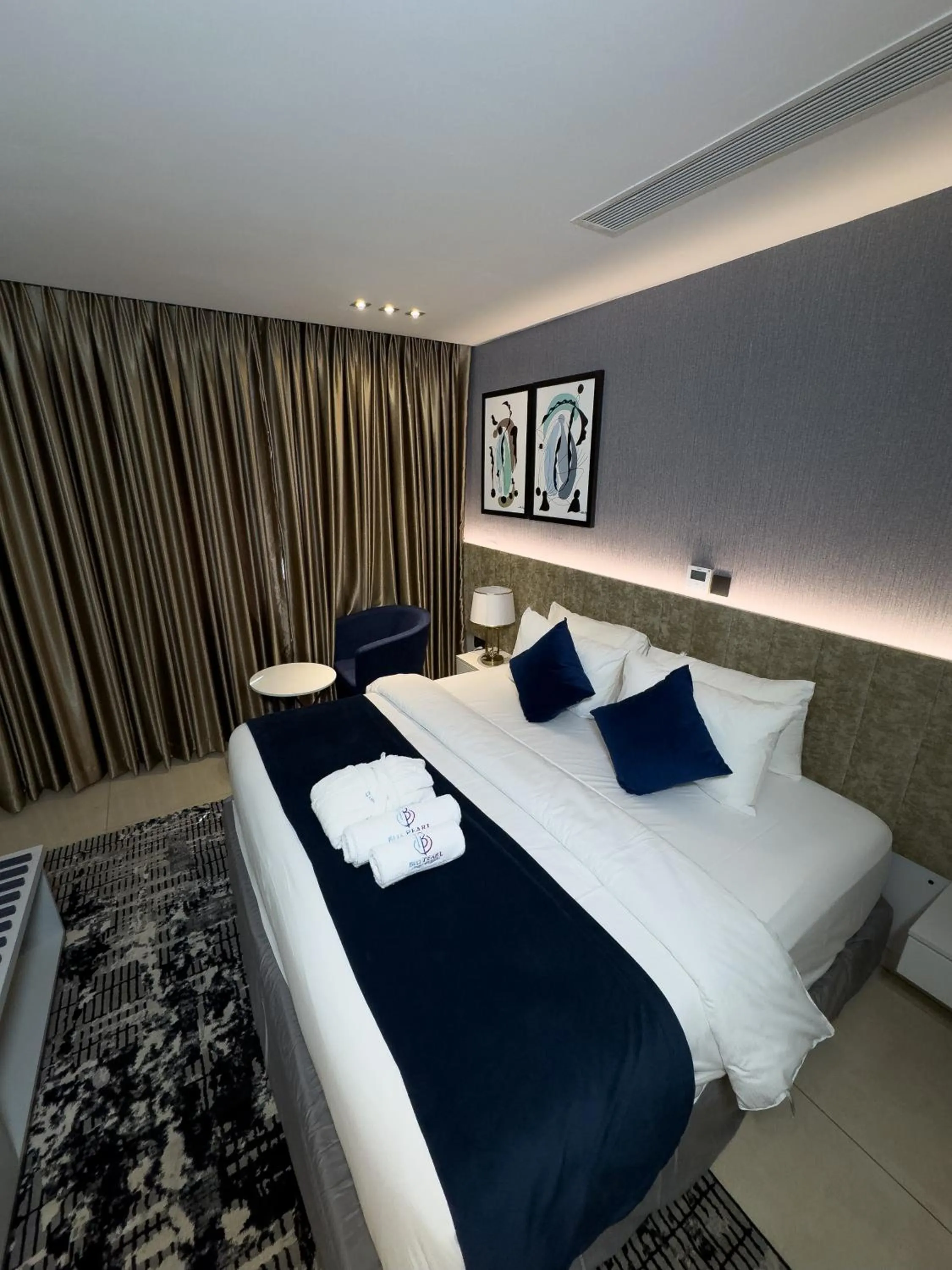 Bedroom in Blu Pearl Hotel & Residence