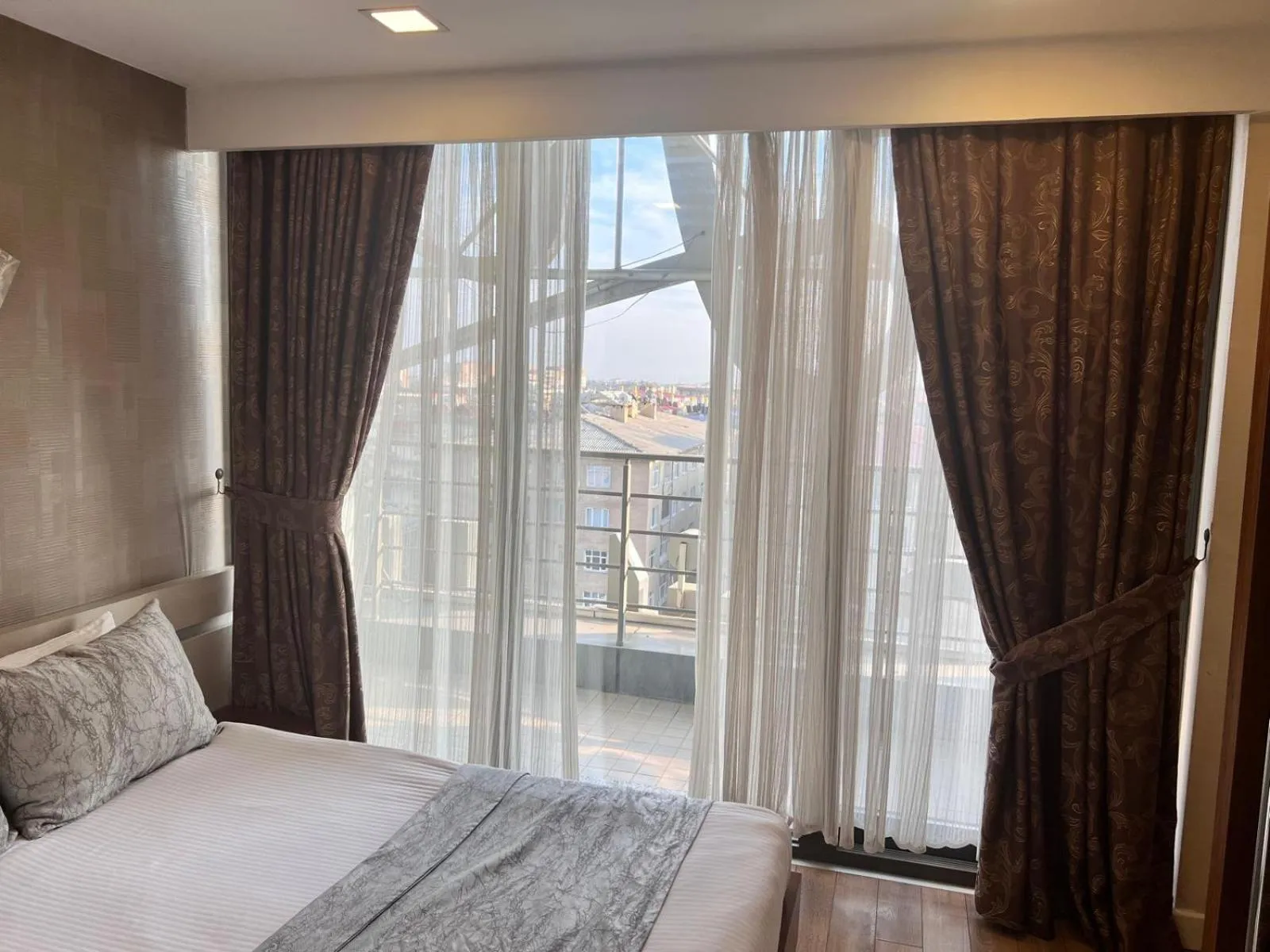 Bed in Liv Suit Hotel