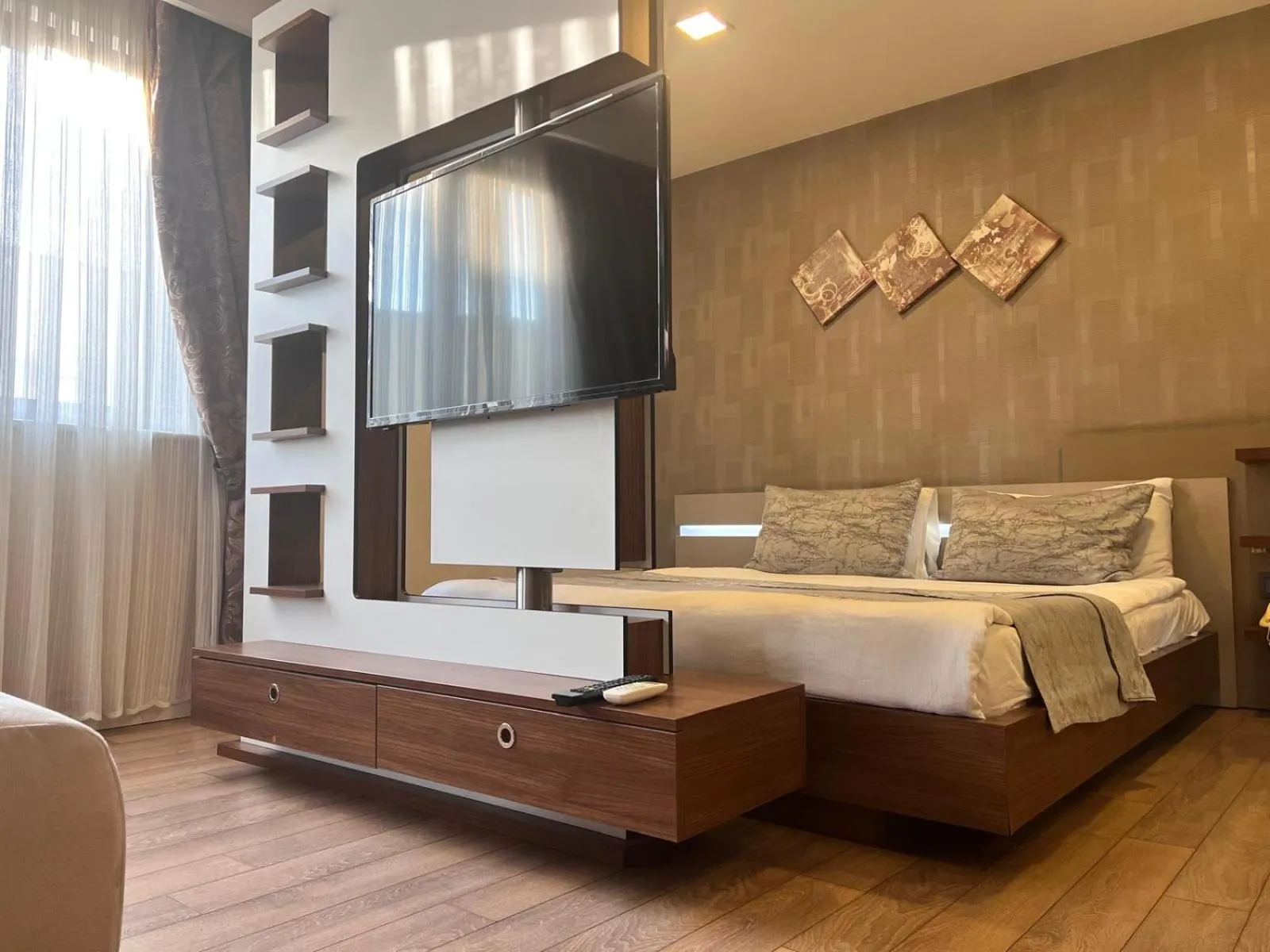 Bed in Liv Suit Hotel