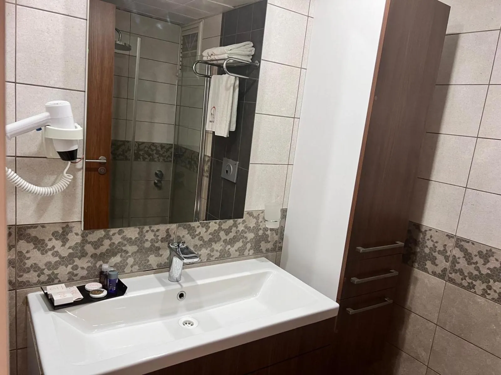 Shower in Liv Suit Hotel