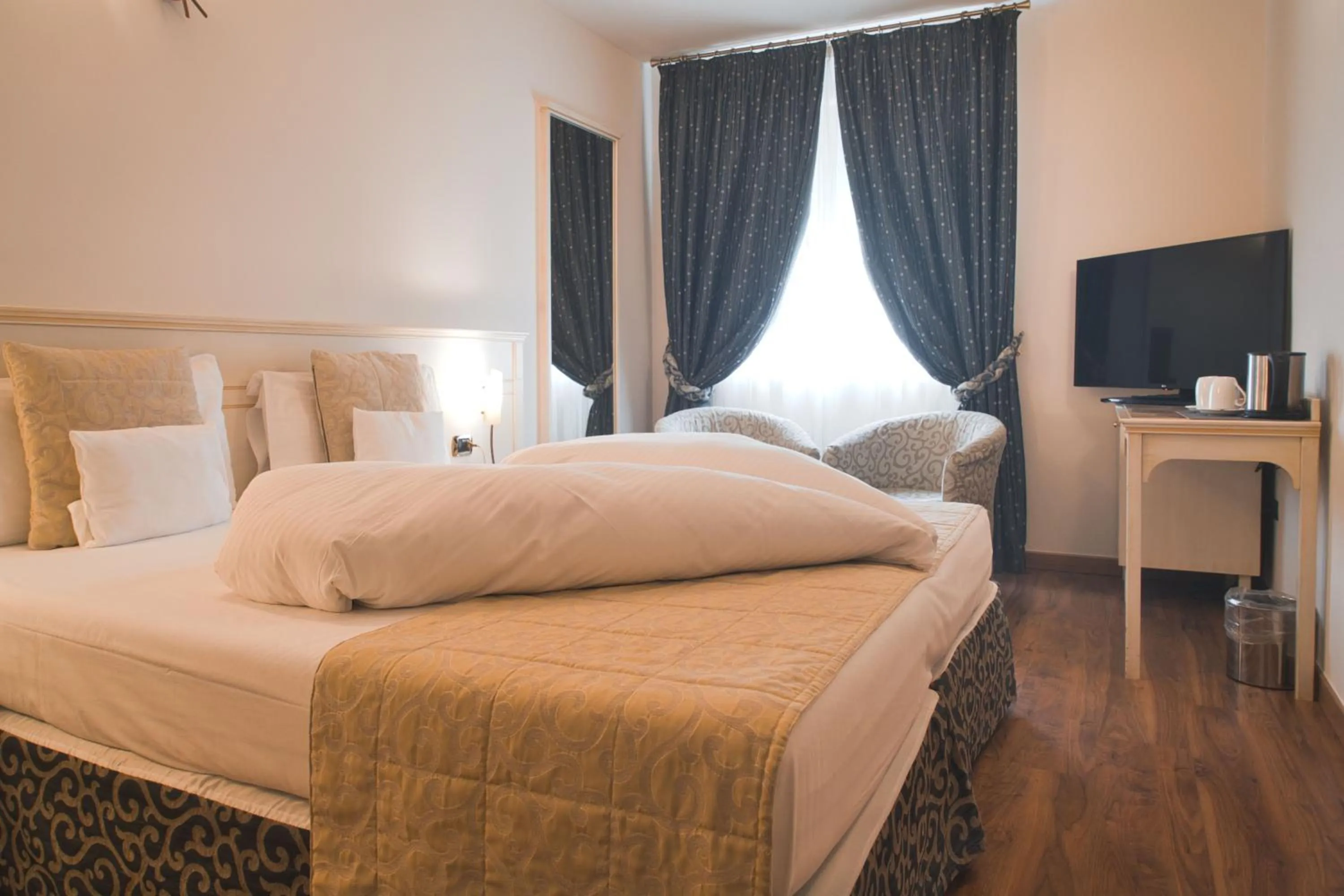 Bed in Villa Nicolli Romantic Spa Resort - Adults Only