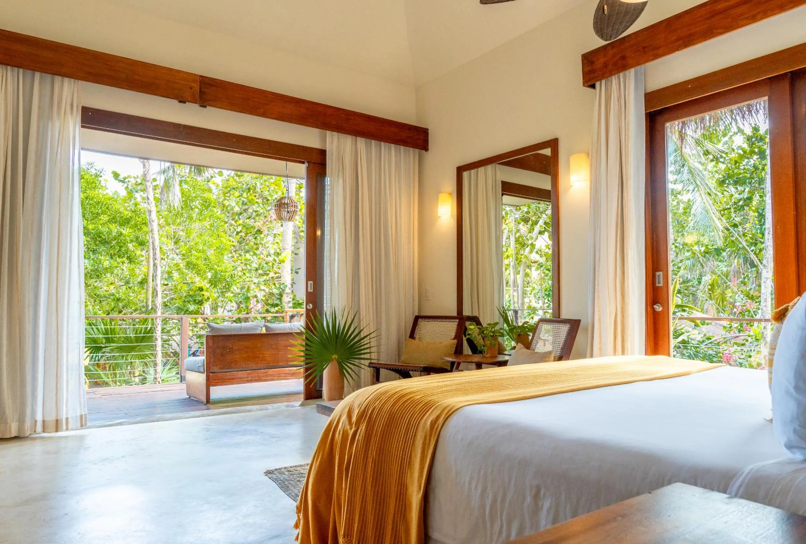 Bed in La Zebra Tulum, a Small Luxury Hotel