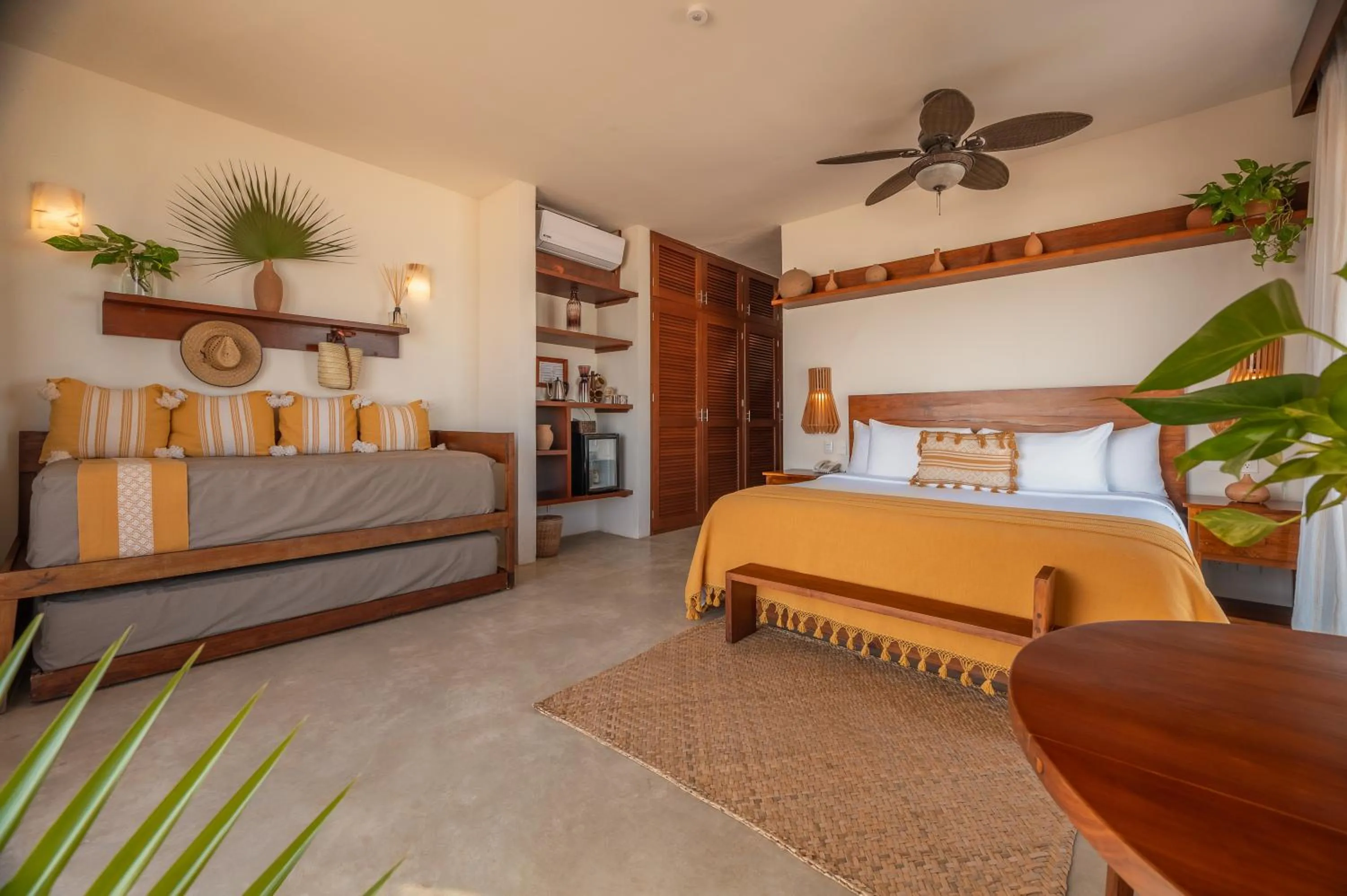 Bed in La Zebra Tulum, a Small Luxury Hotel