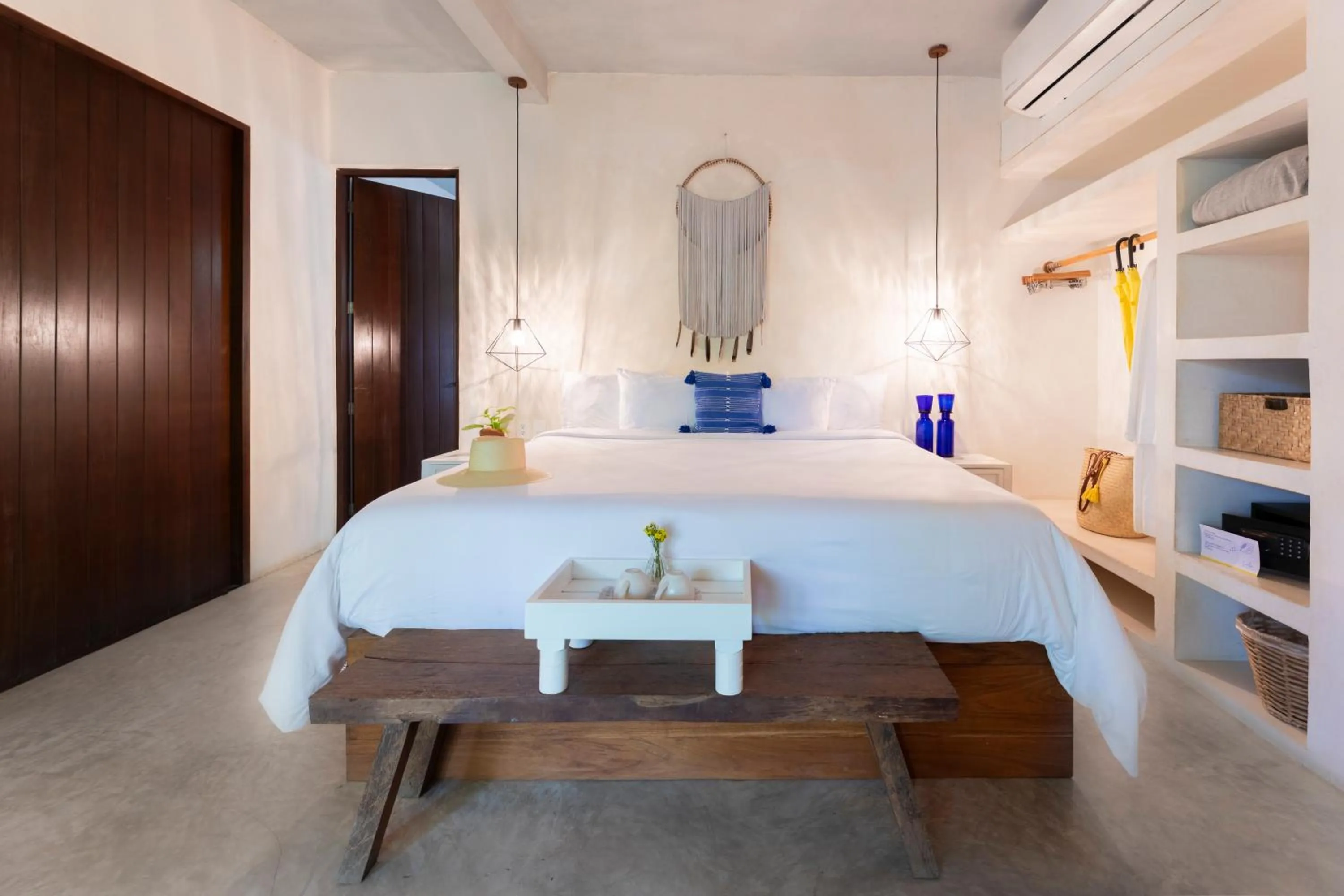 Bed in La Zebra Tulum, a Small Luxury Hotel