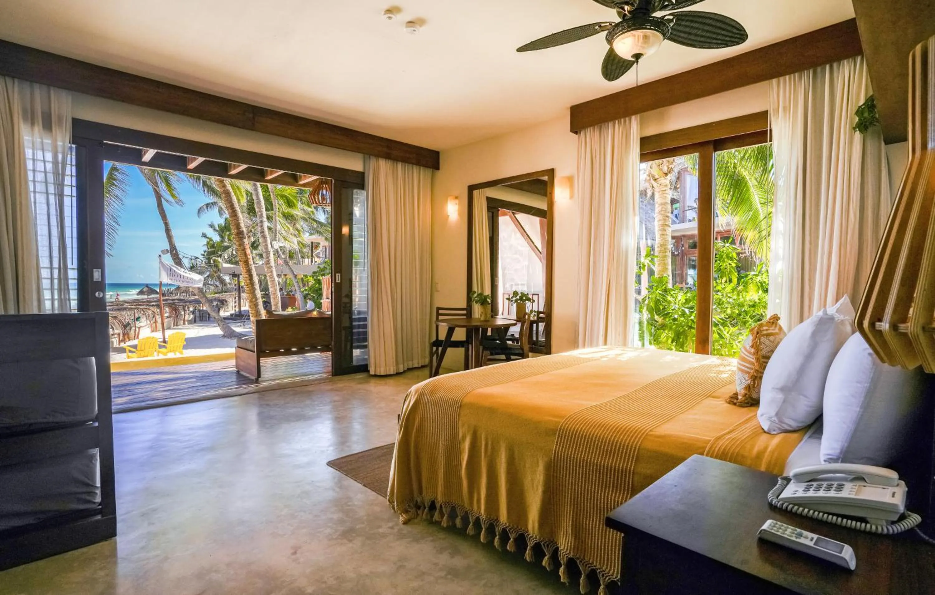 Bed in La Zebra Tulum, a Small Luxury Hotel