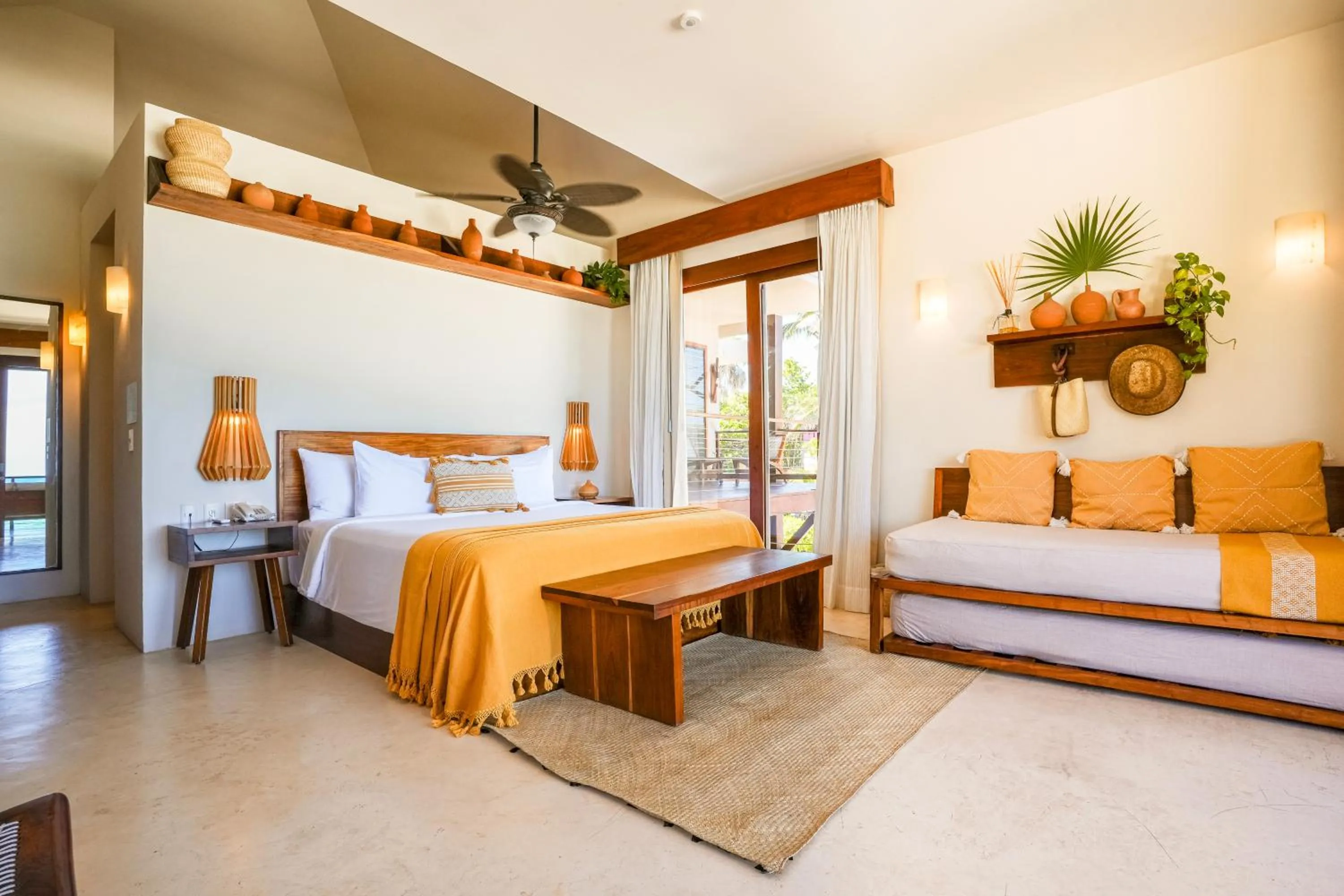 Bed in La Zebra Tulum, a Small Luxury Hotel