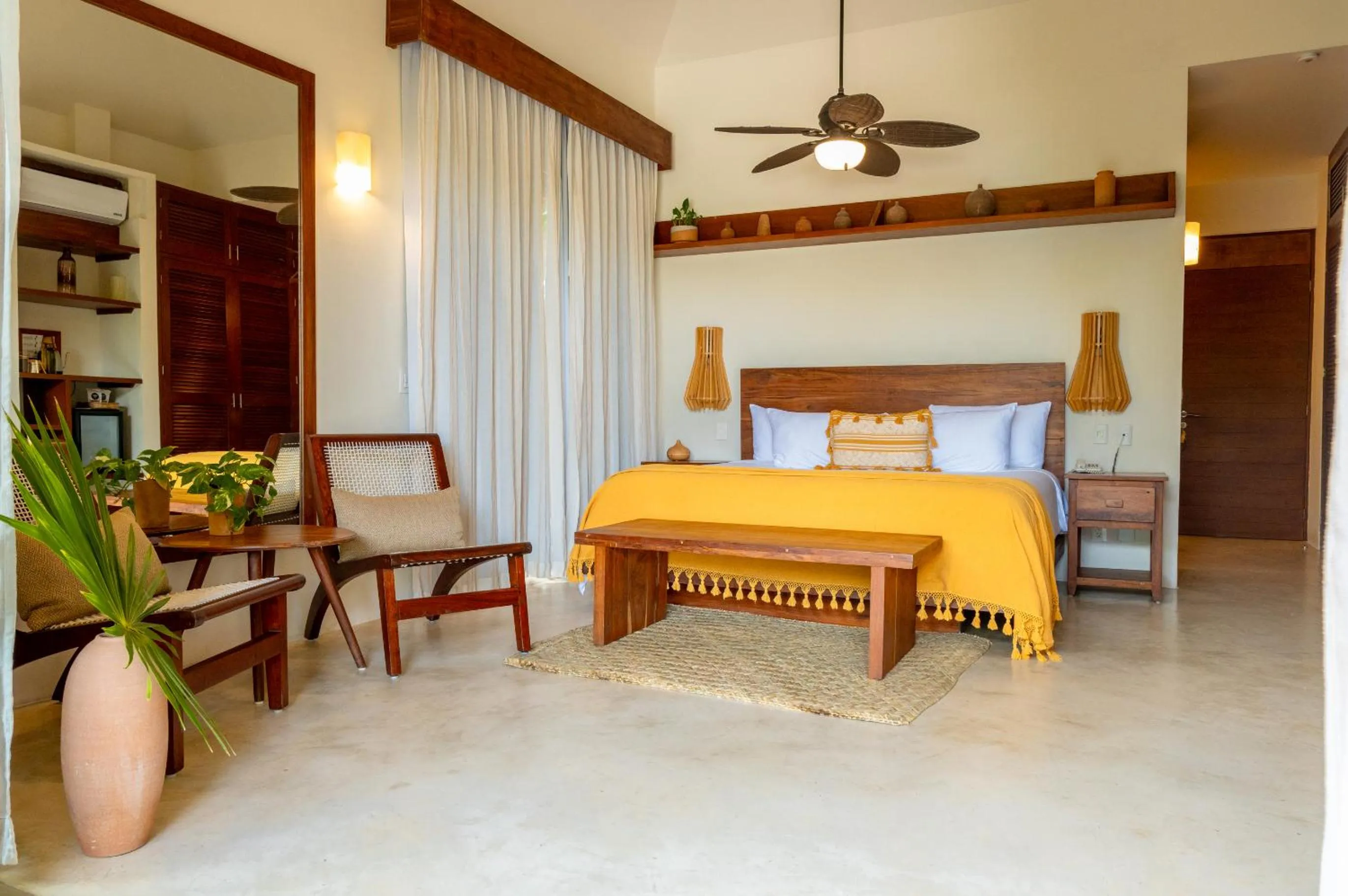 Bed in La Zebra Tulum, a Small Luxury Hotel