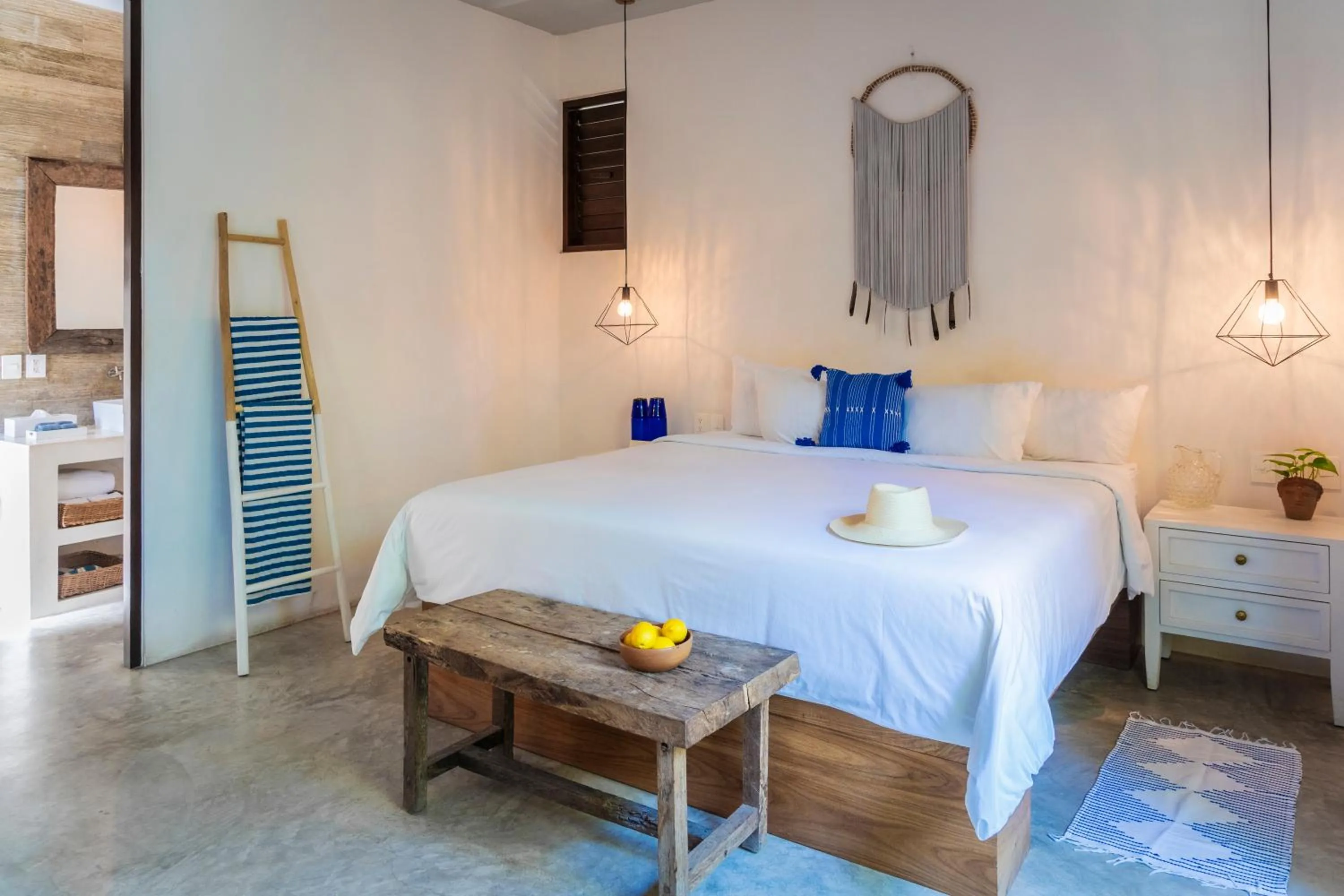 Bed in La Zebra Tulum, a Small Luxury Hotel