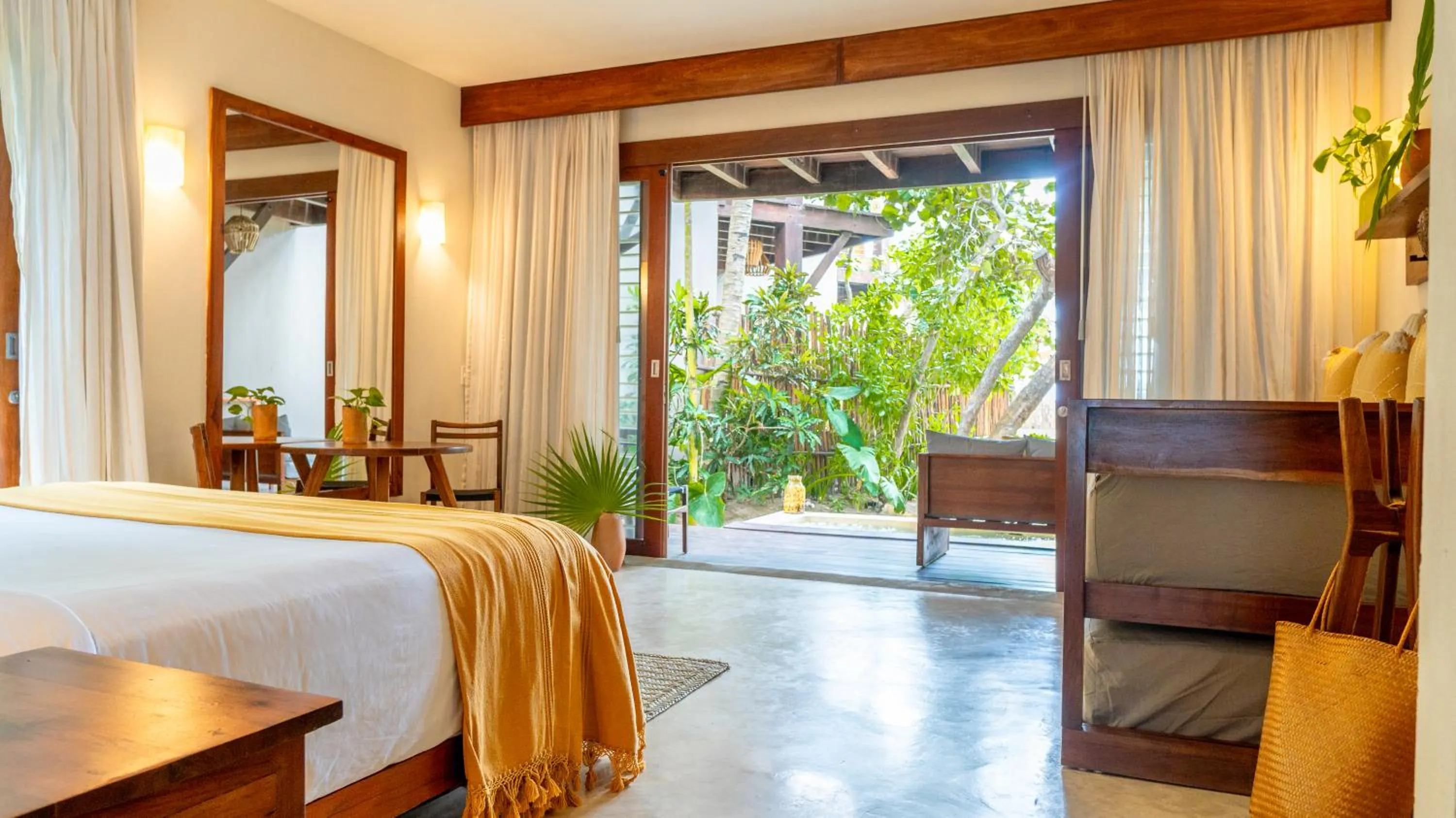 Bed in La Zebra Tulum, a Small Luxury Hotel