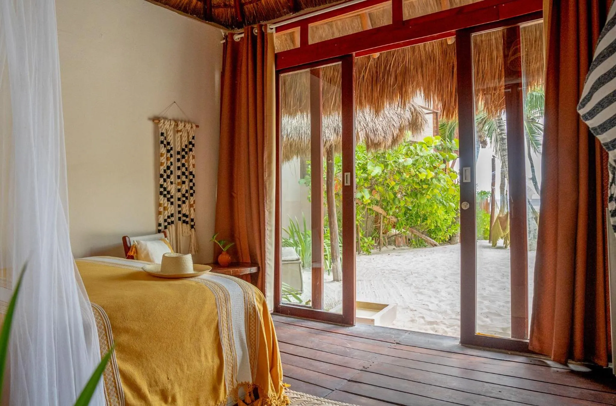 Bed in La Zebra Tulum, a Small Luxury Hotel