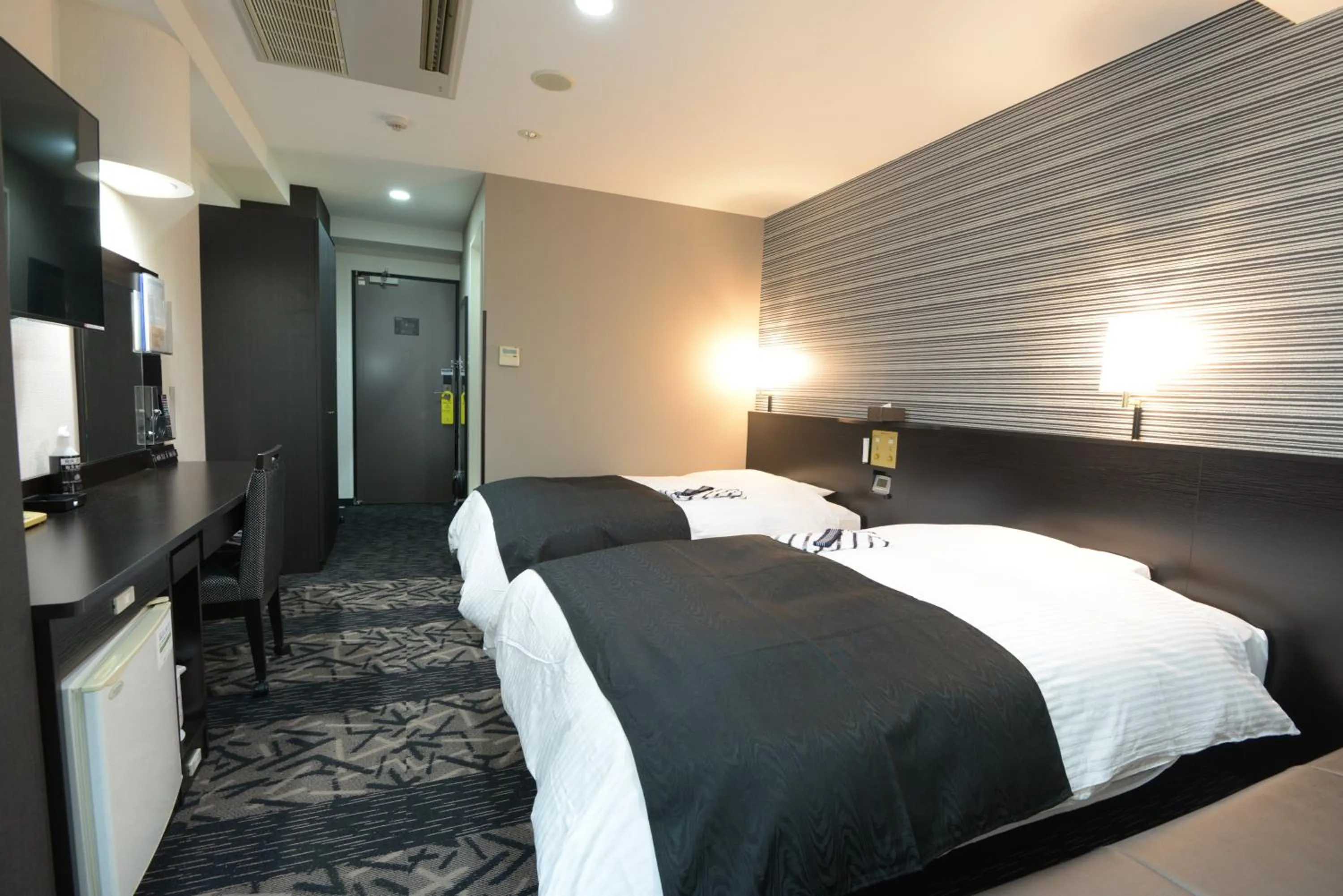 Photo of the whole room, Bed in APA Hotel Suzuka-Chuou