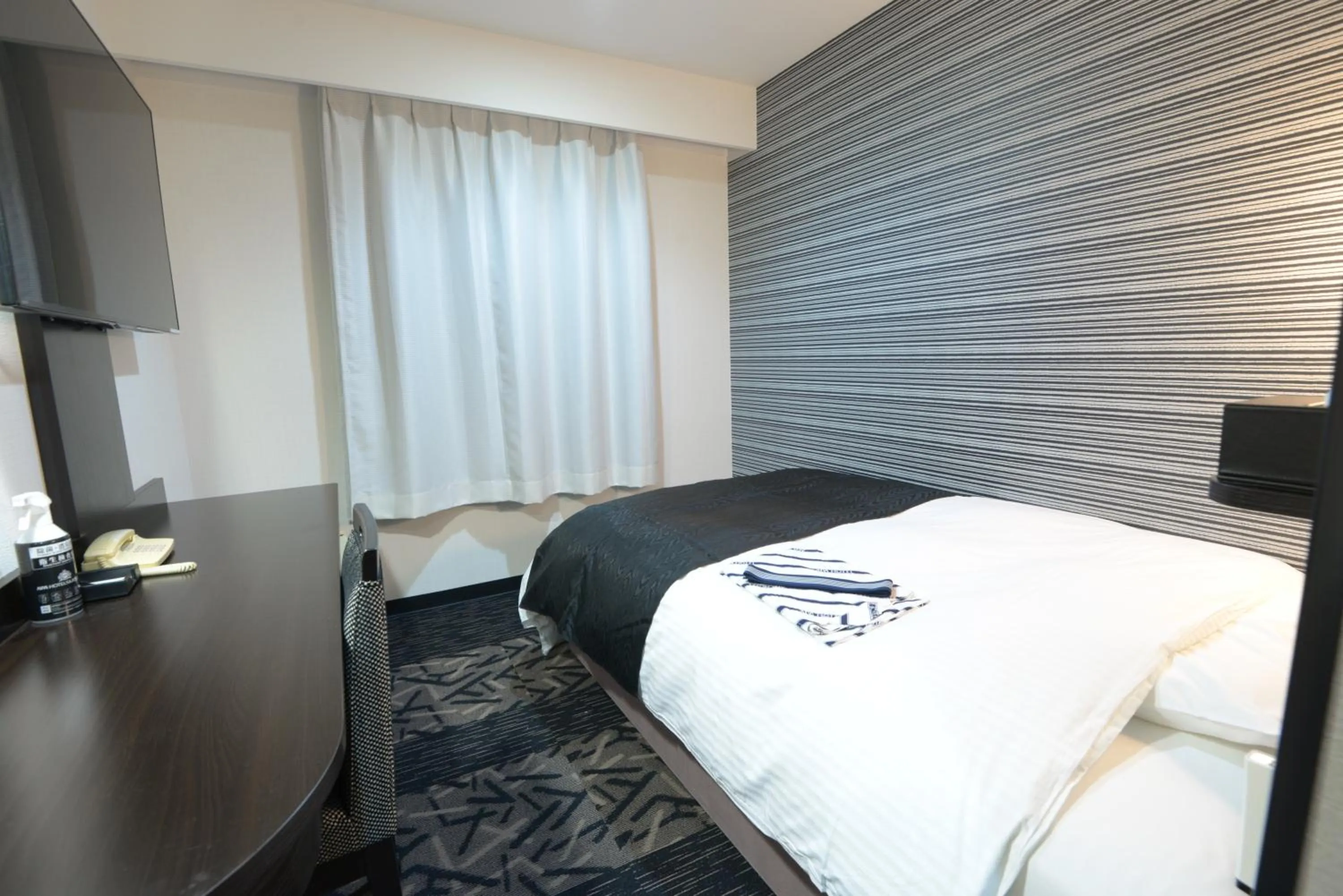 Photo of the whole room, Bed in APA Hotel Suzuka-Chuou
