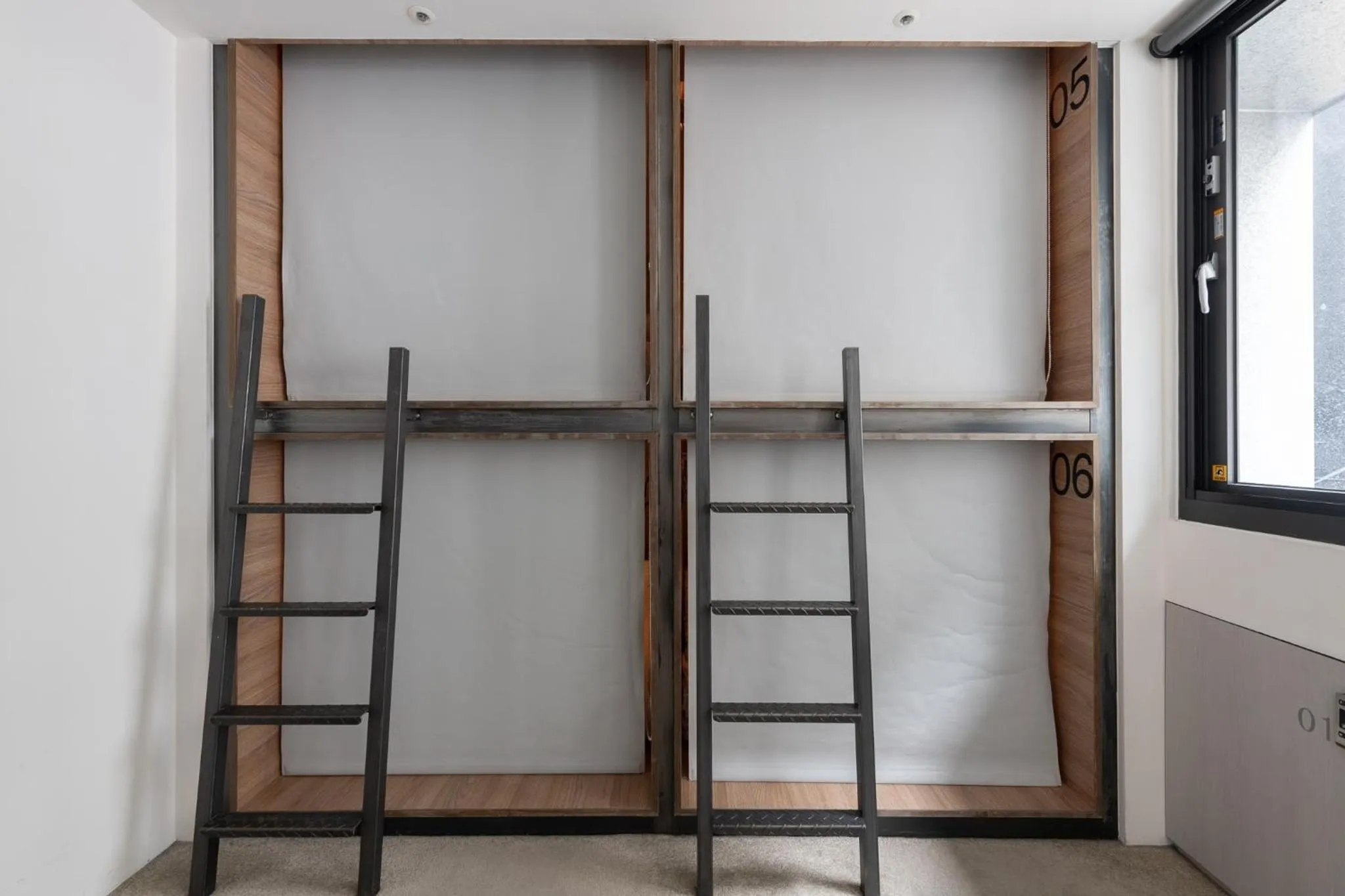 bunk bed in Bouti City Capsule Inn