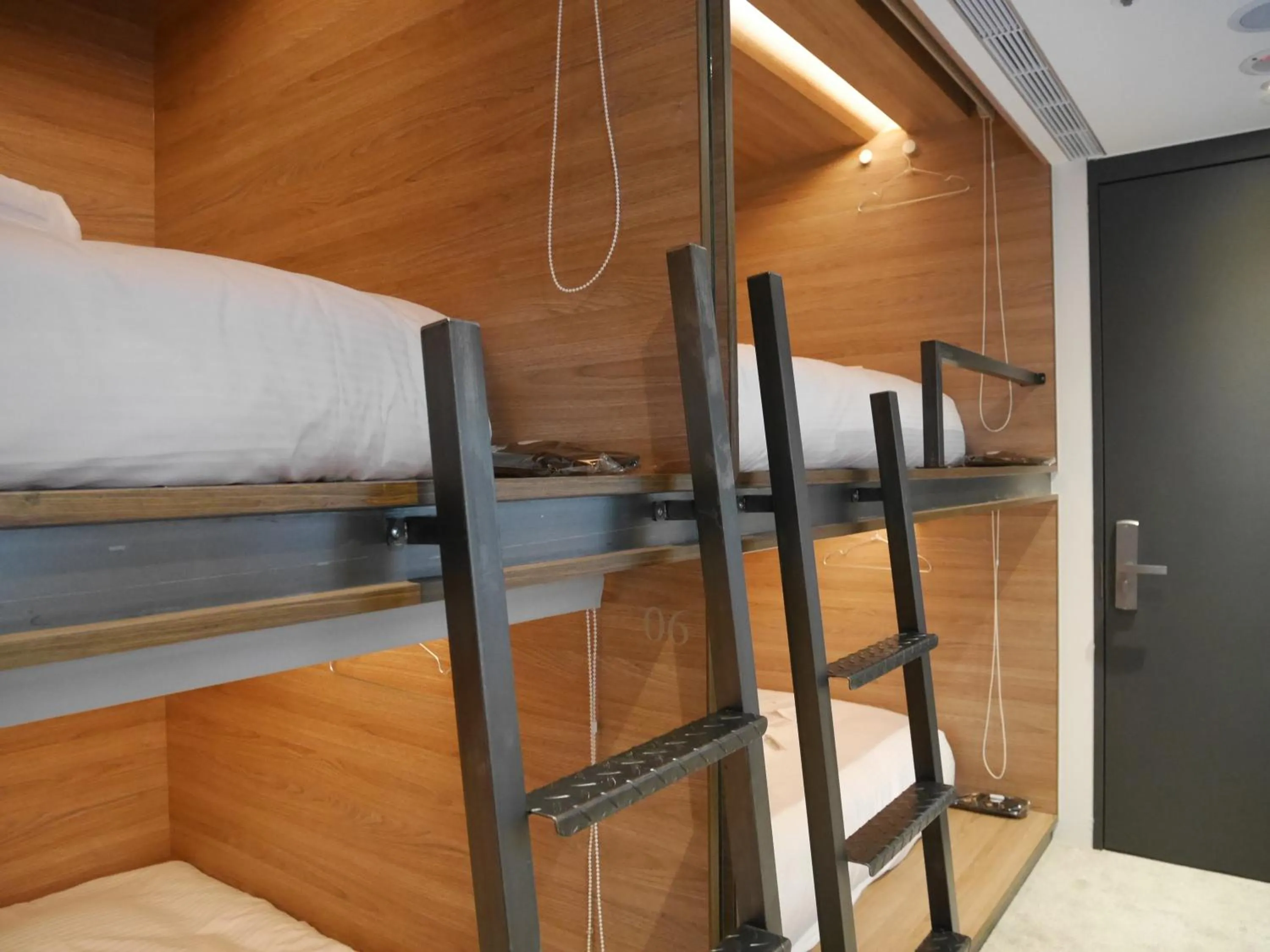 bunk bed in Bouti City Capsule Inn