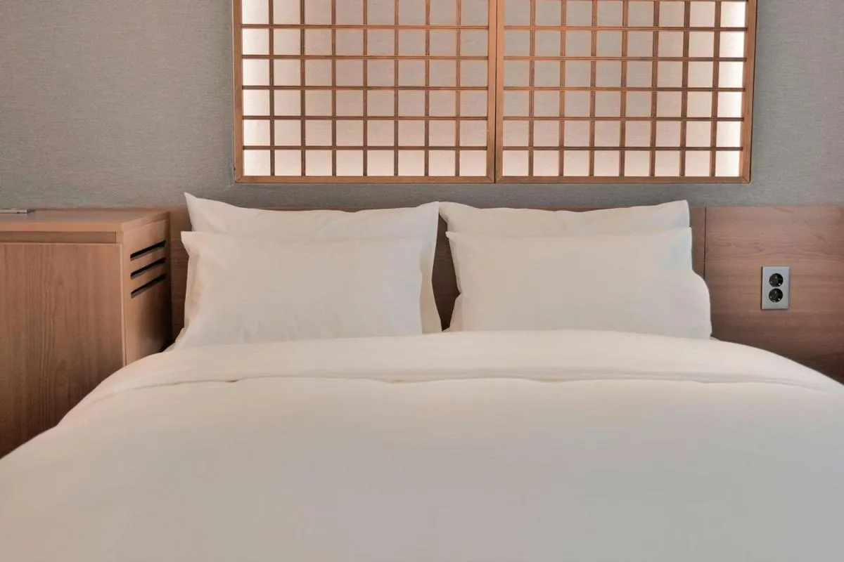 Bed in Yeon Hwa Moon Hotel