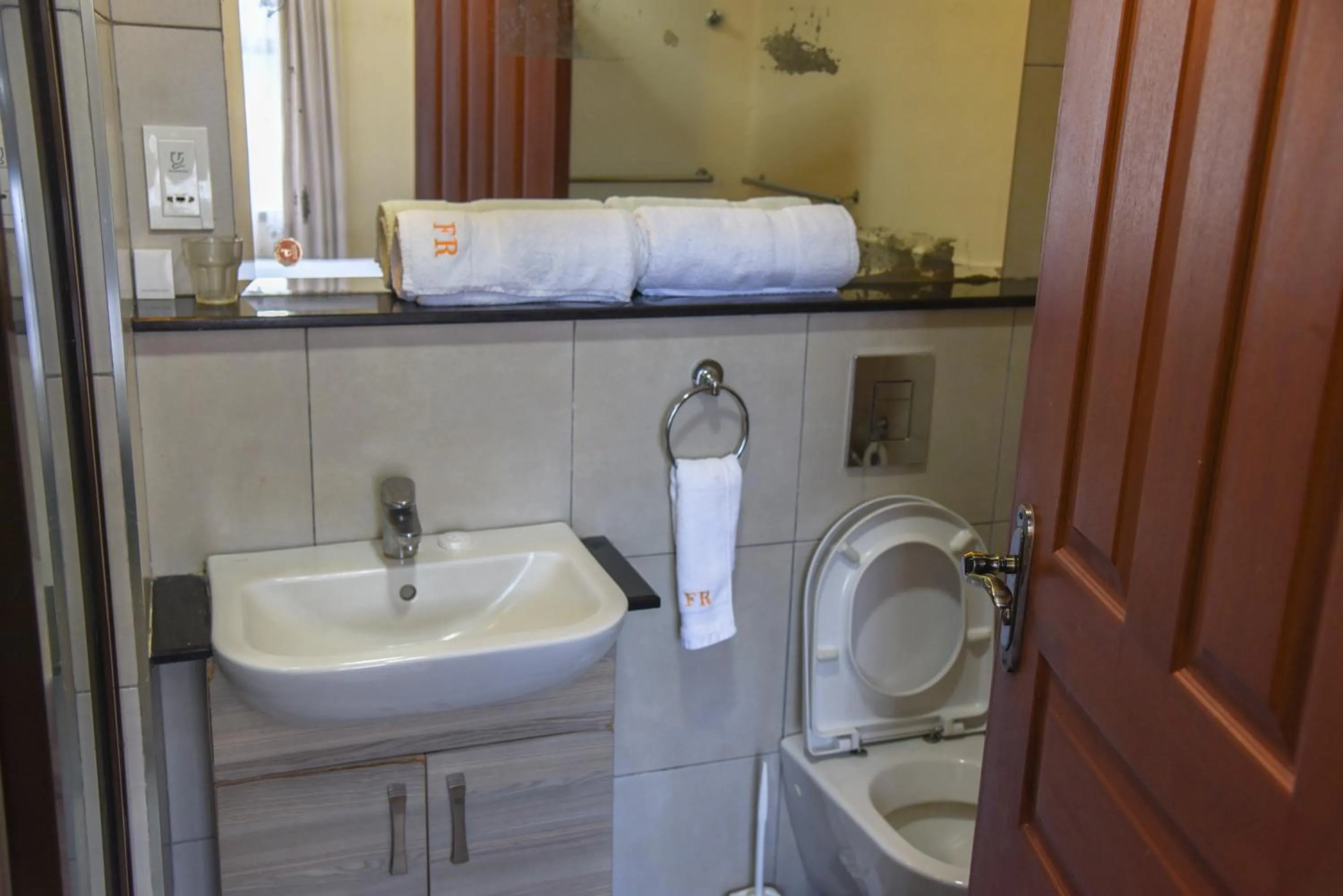 Toilet in Fedha Residences by Trianum