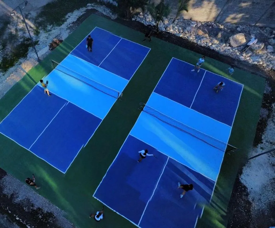 Property building in Bluewaves Hostel & Villa Panagsama by Hiverooms