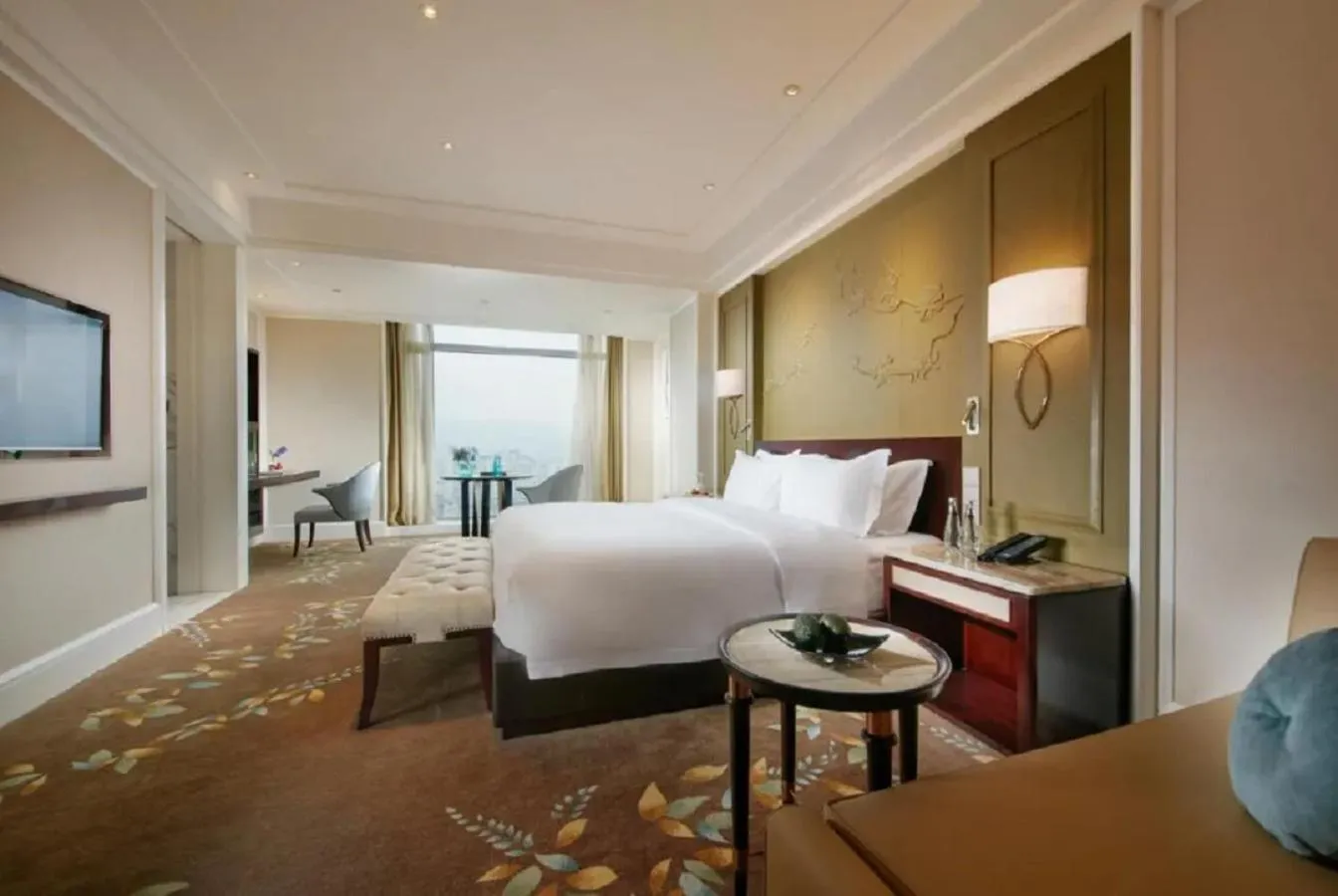 Photo of the whole room, Bed in Wen Ling International Hotel