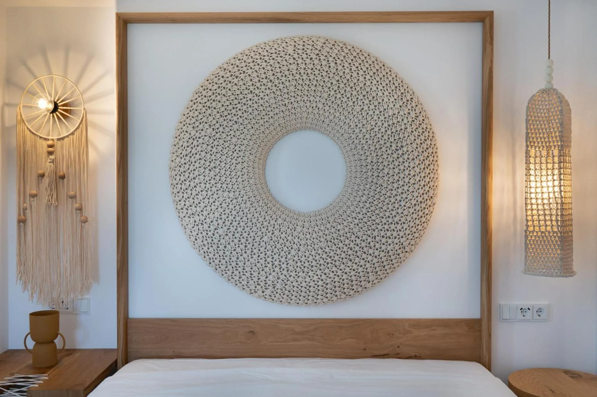 Bed in Kosmitis Suites & Villas