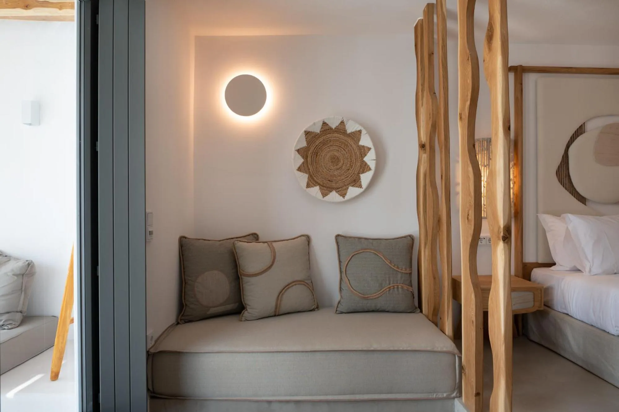 Seating area, Bed in Kosmitis Suites & Villas